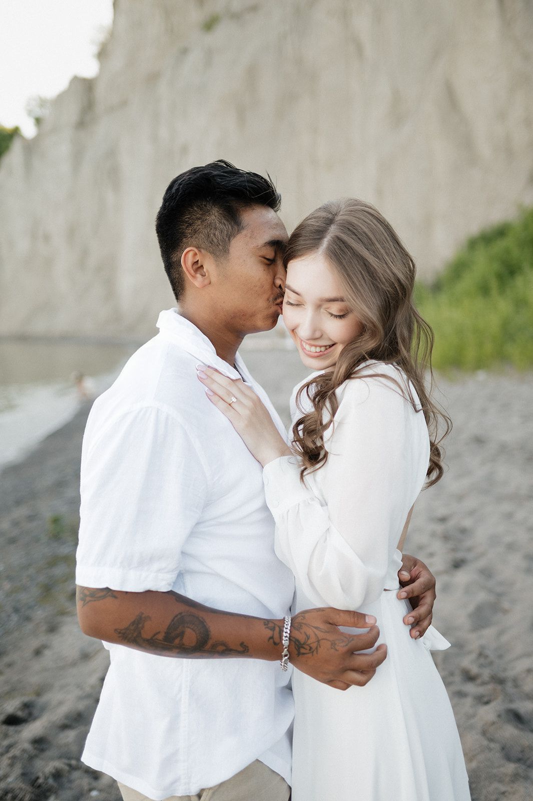 Couples portrait during engagement shoot at Scarborough Bluffs, Toronto
