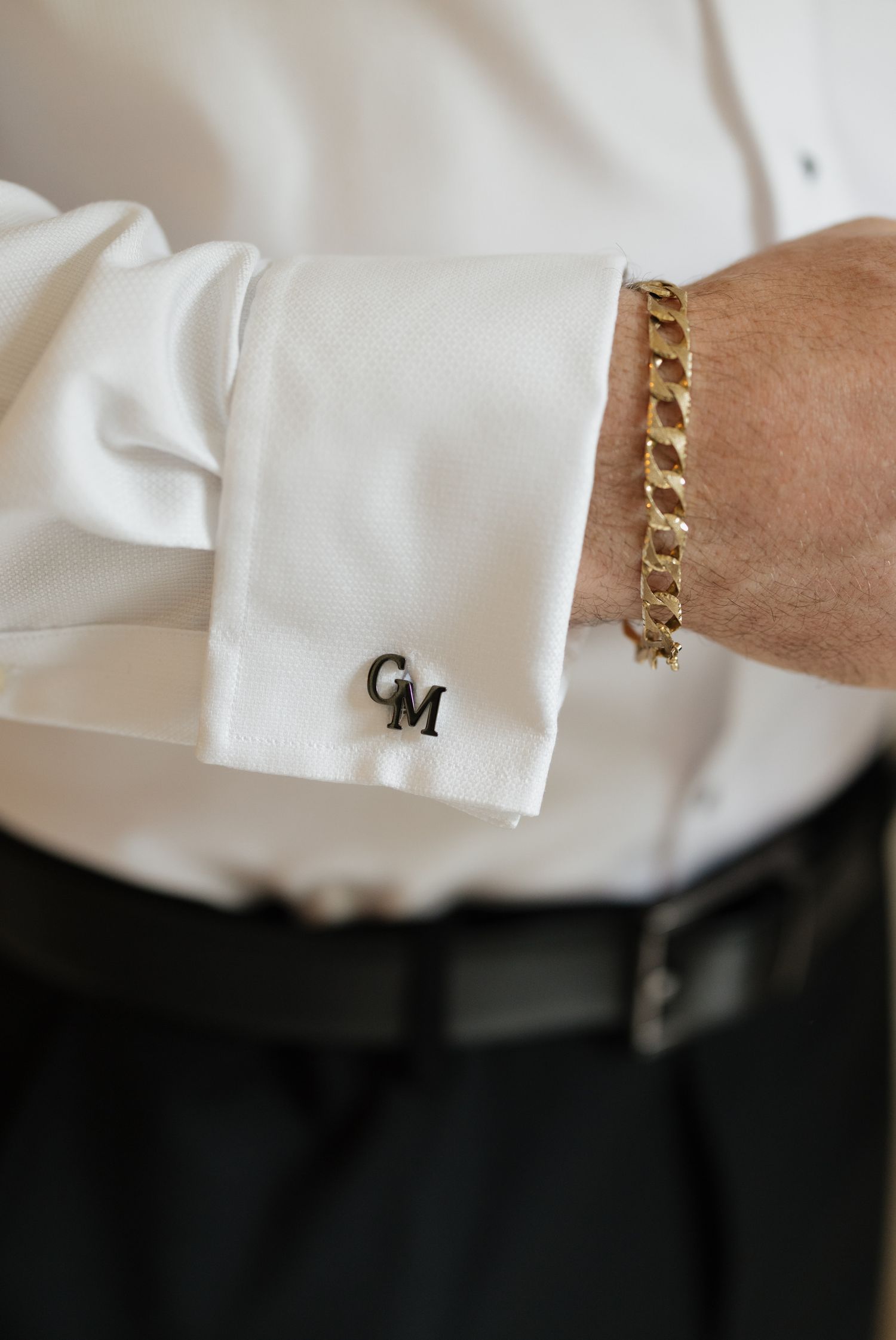 Groom detail of cufflink at Sandos Caracol Eco resort Mexico