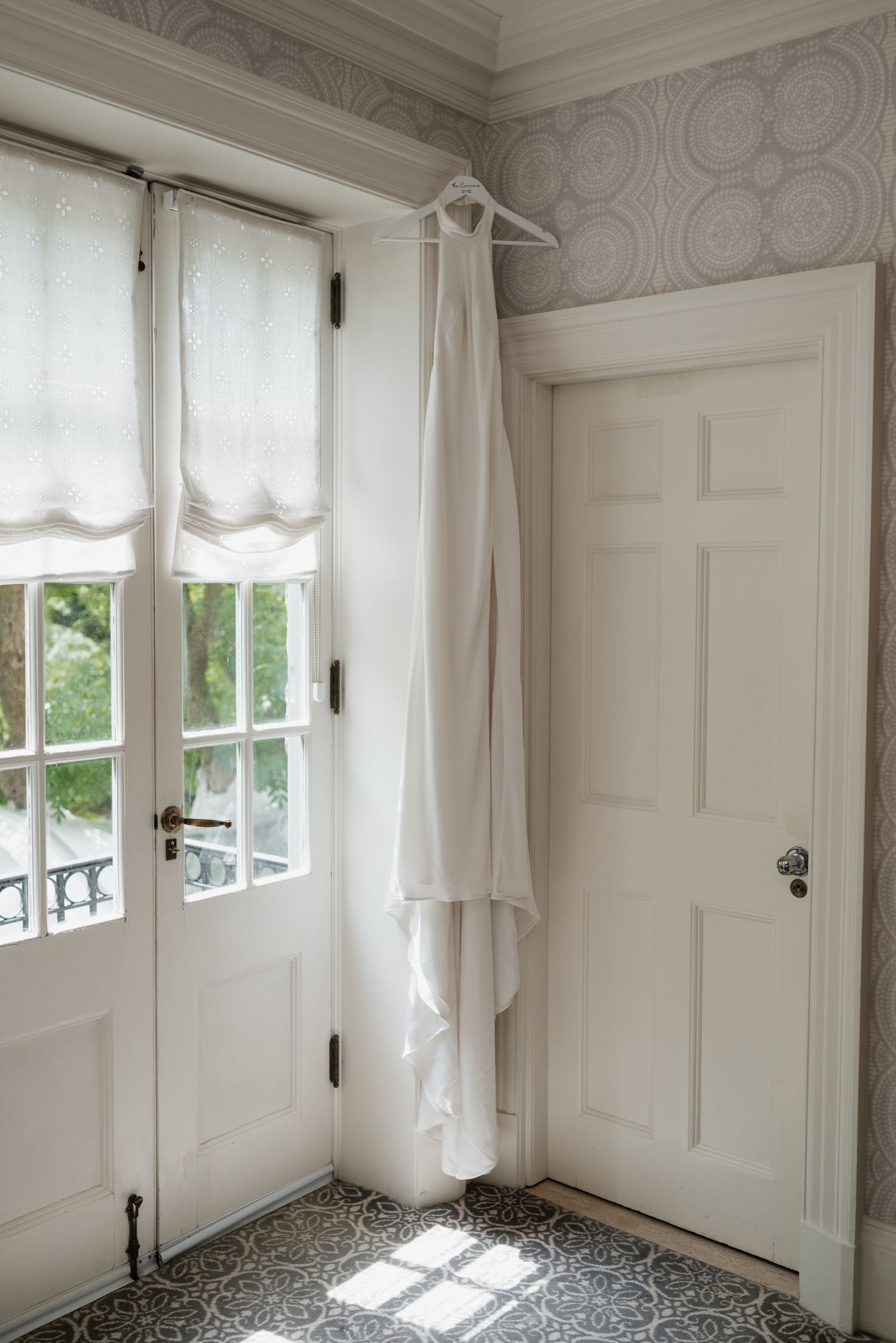 Dress hanging in window at Graydon Hall Manor, Toronto