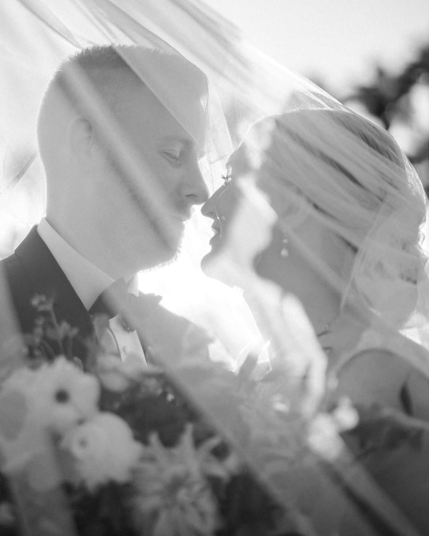 Artistic black and white photography with dreamy, ethereal light effects.