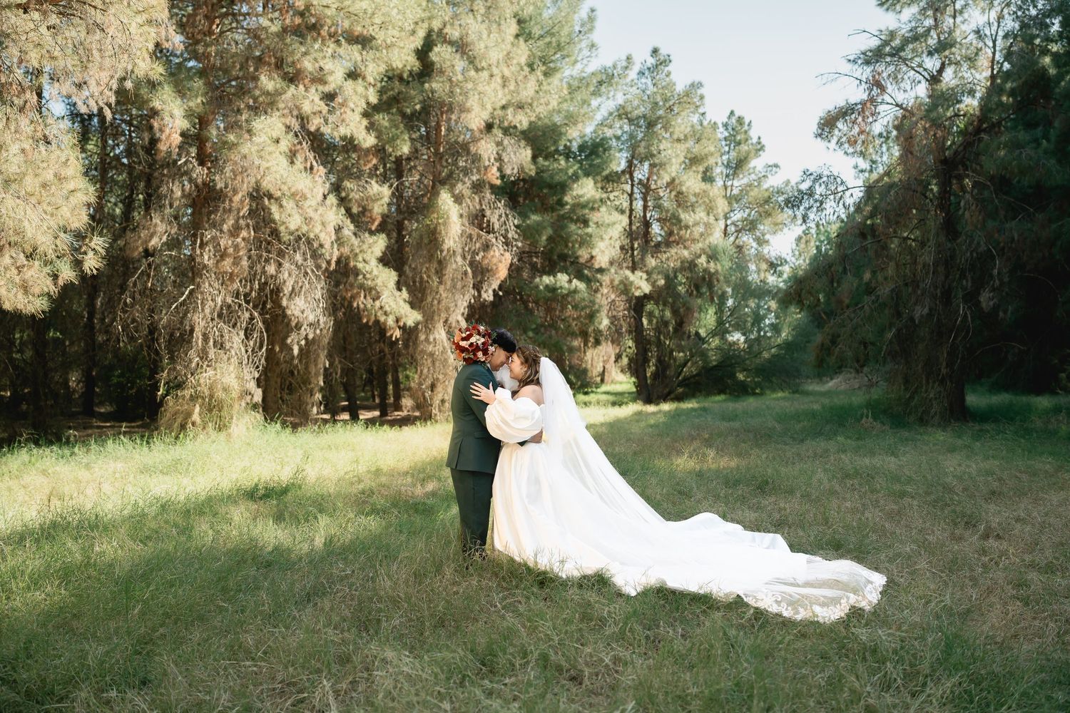 Natural wedding photography sequence showing couple walking through wooded area.