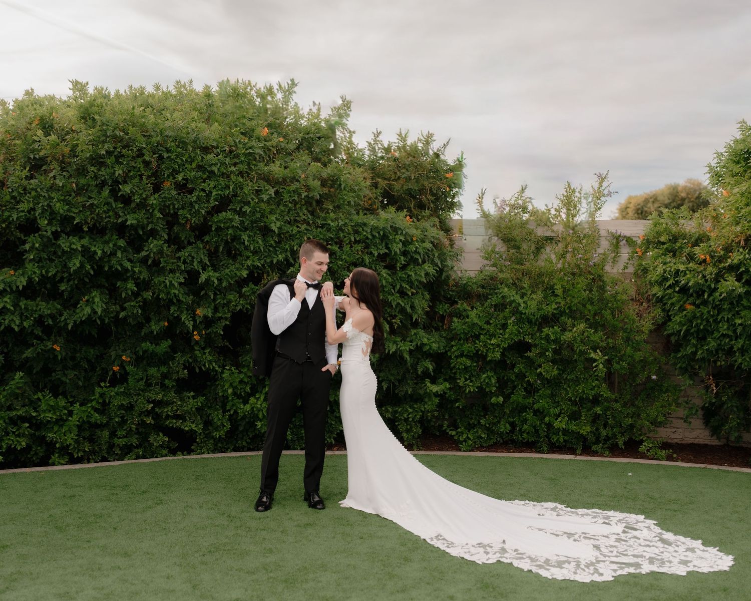 A series of wedding photos showing a couple in formal attire against a garden hedge backdrop.