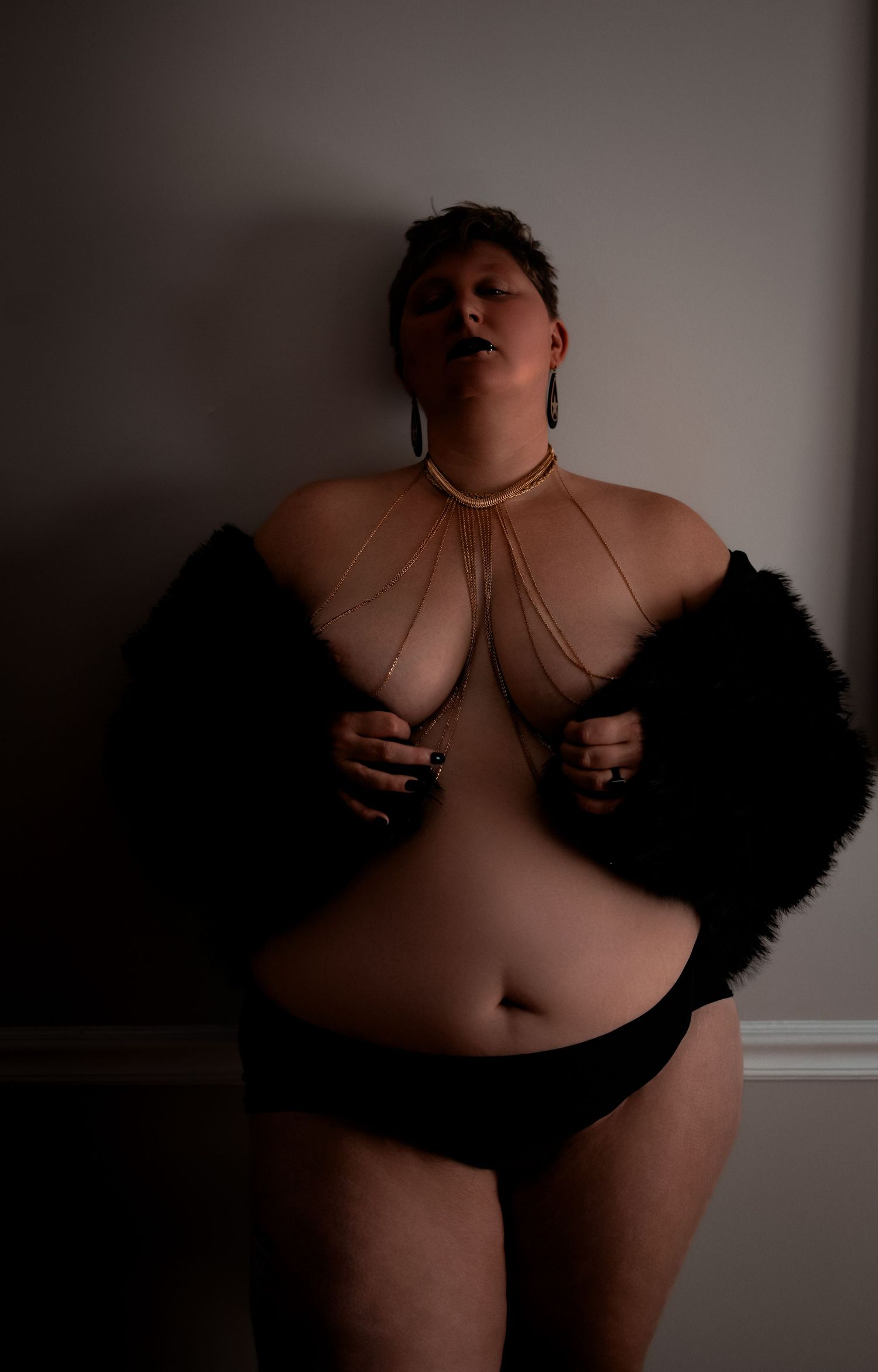Artistic boudoir photography series featuring dark silhouettes against a light background.