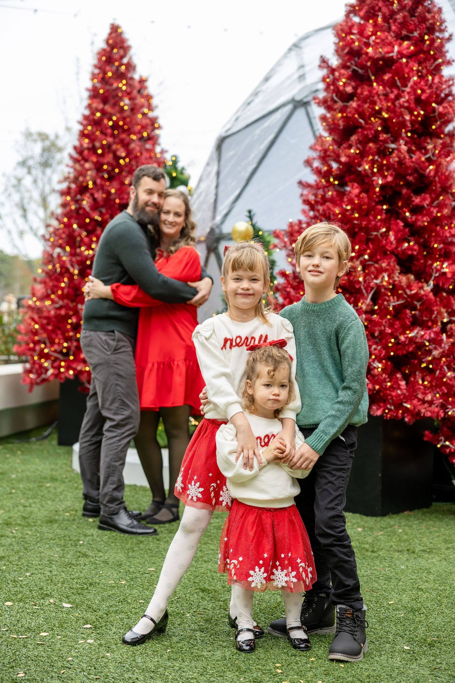 Fenton, NC Photos with Santa 2026 mini sessions in Cary, NC for holiday Christmas photos- holiday card portrait of a family
