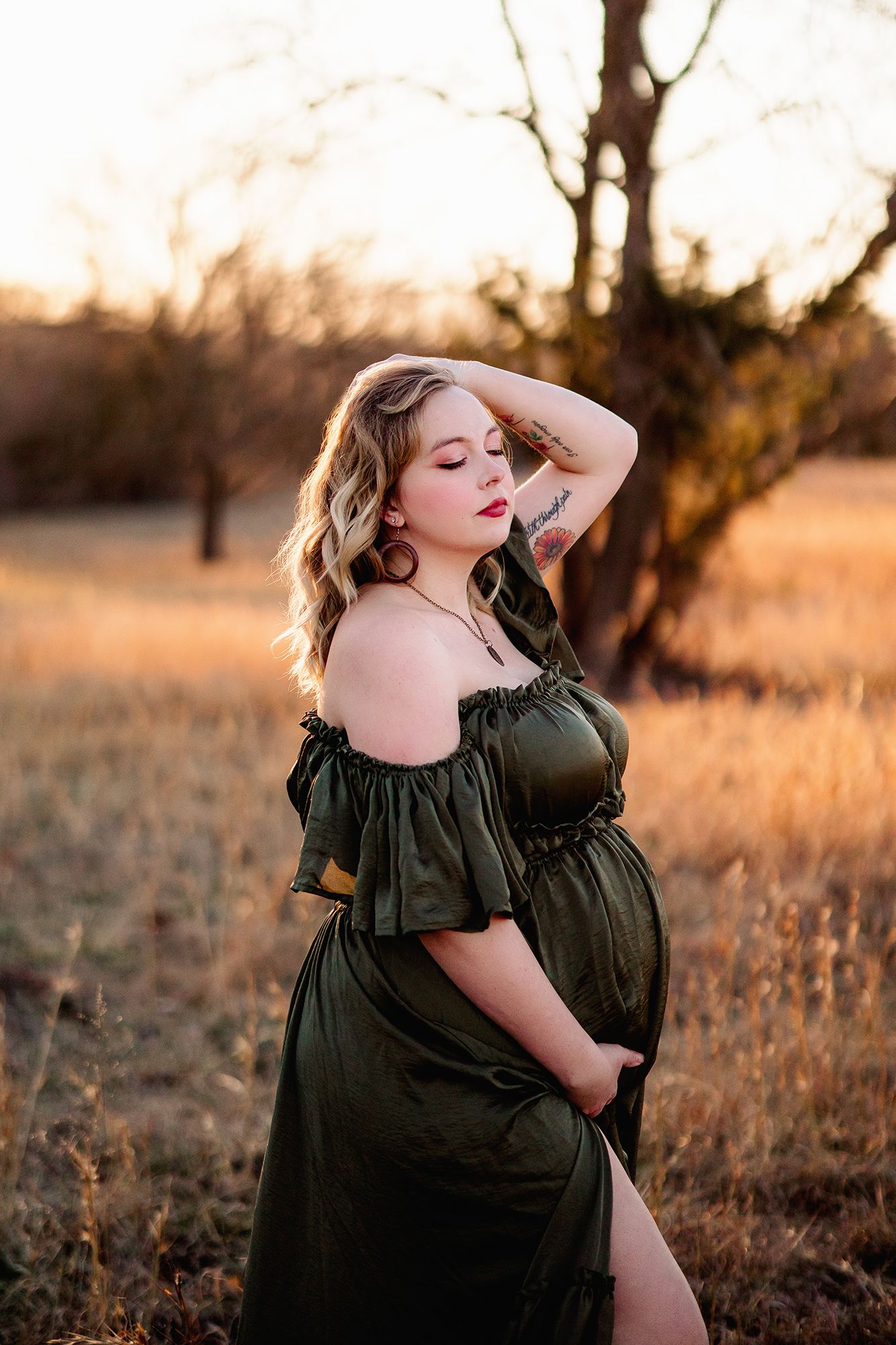 mom to be wearing olive green boho dress at golden hour in shawnee mission park, ks