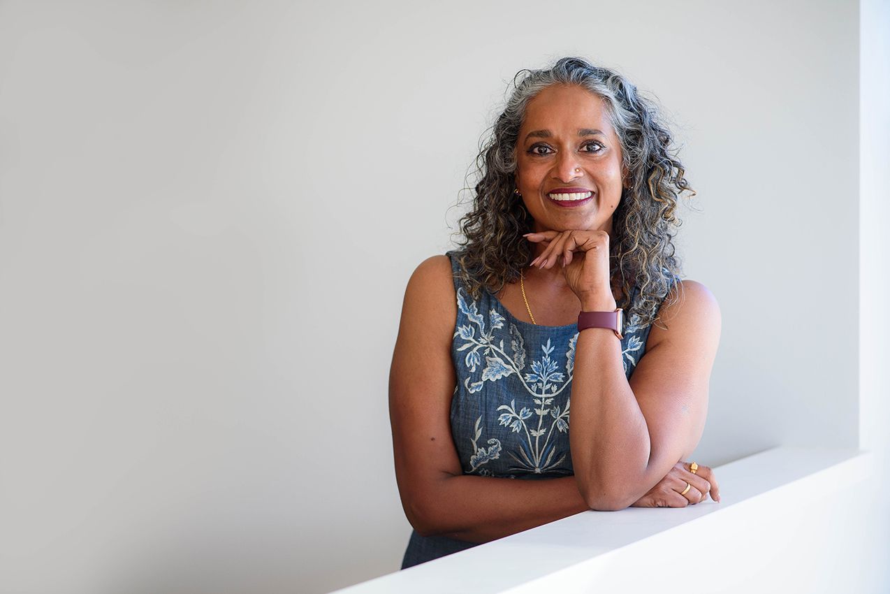 Business portrait of a mature woman leaning on a wall - Kelly Chapman Photographer Perth