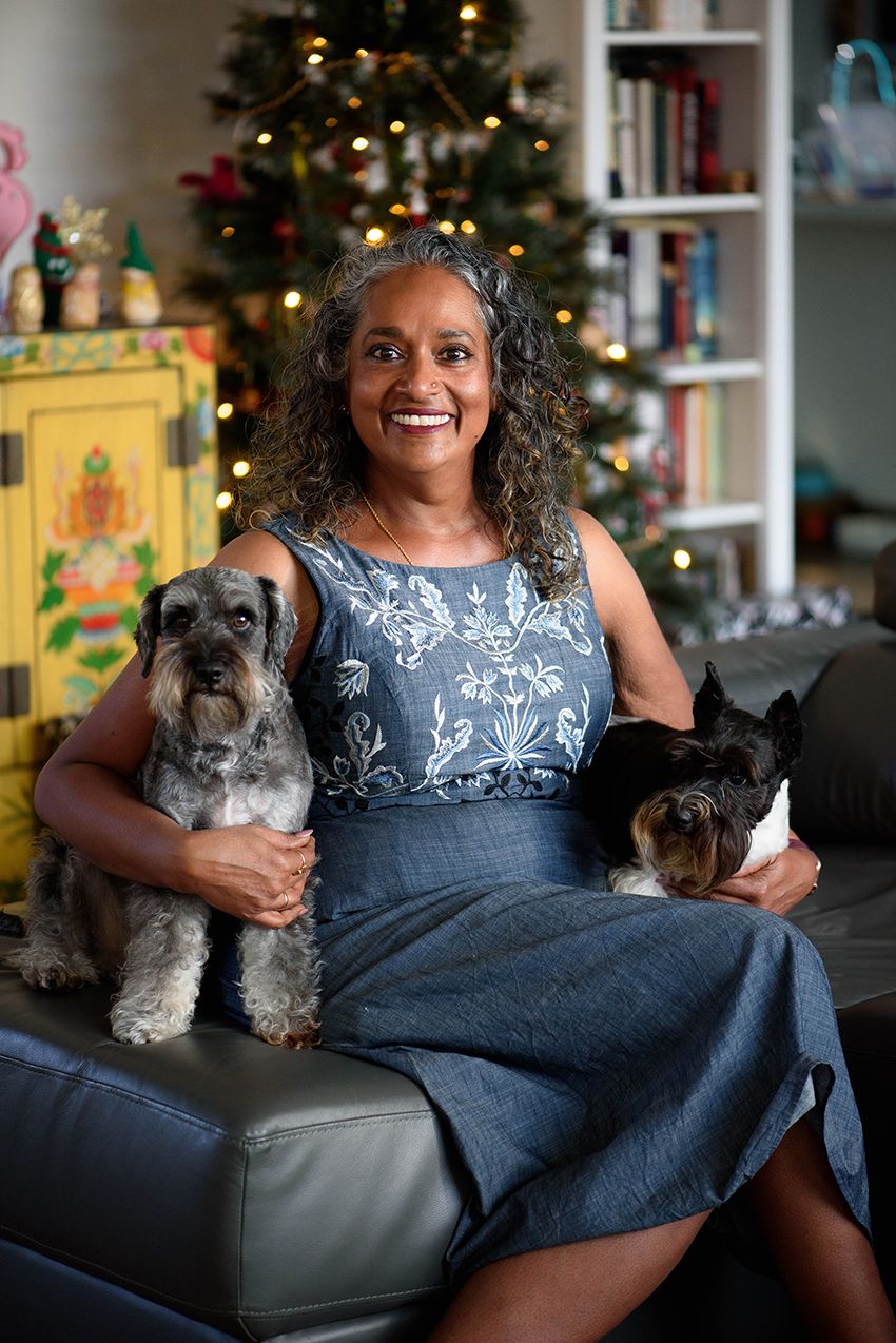 Portrait of a woman with her puppy taken indoors on a couch - Kelly Chapman Photographer Perth