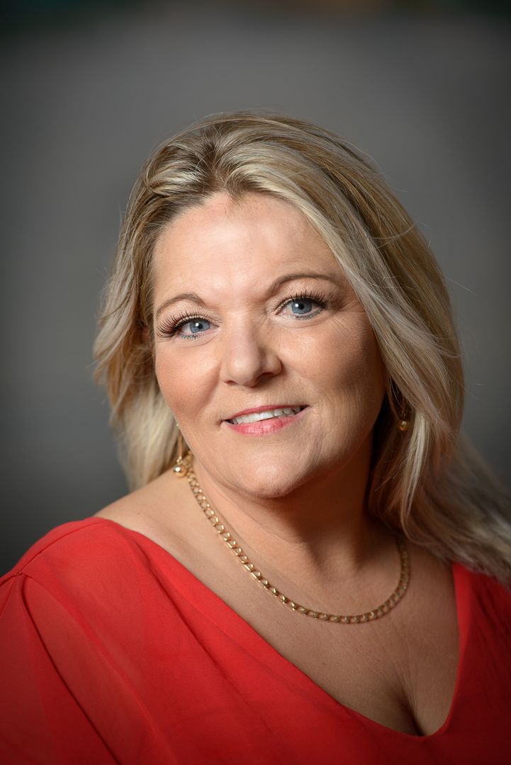 Closeup portrait of a woman in a red dress - Kelly Chapman Photographer Perth