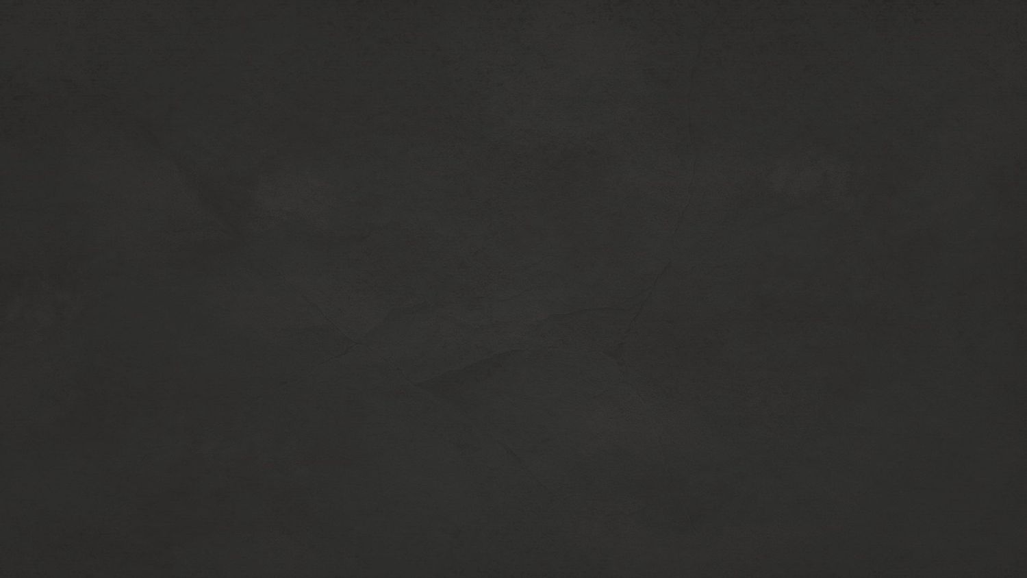 Five black rectangular shapes arranged in a row against a dark background create a minimalist abstract composition.
