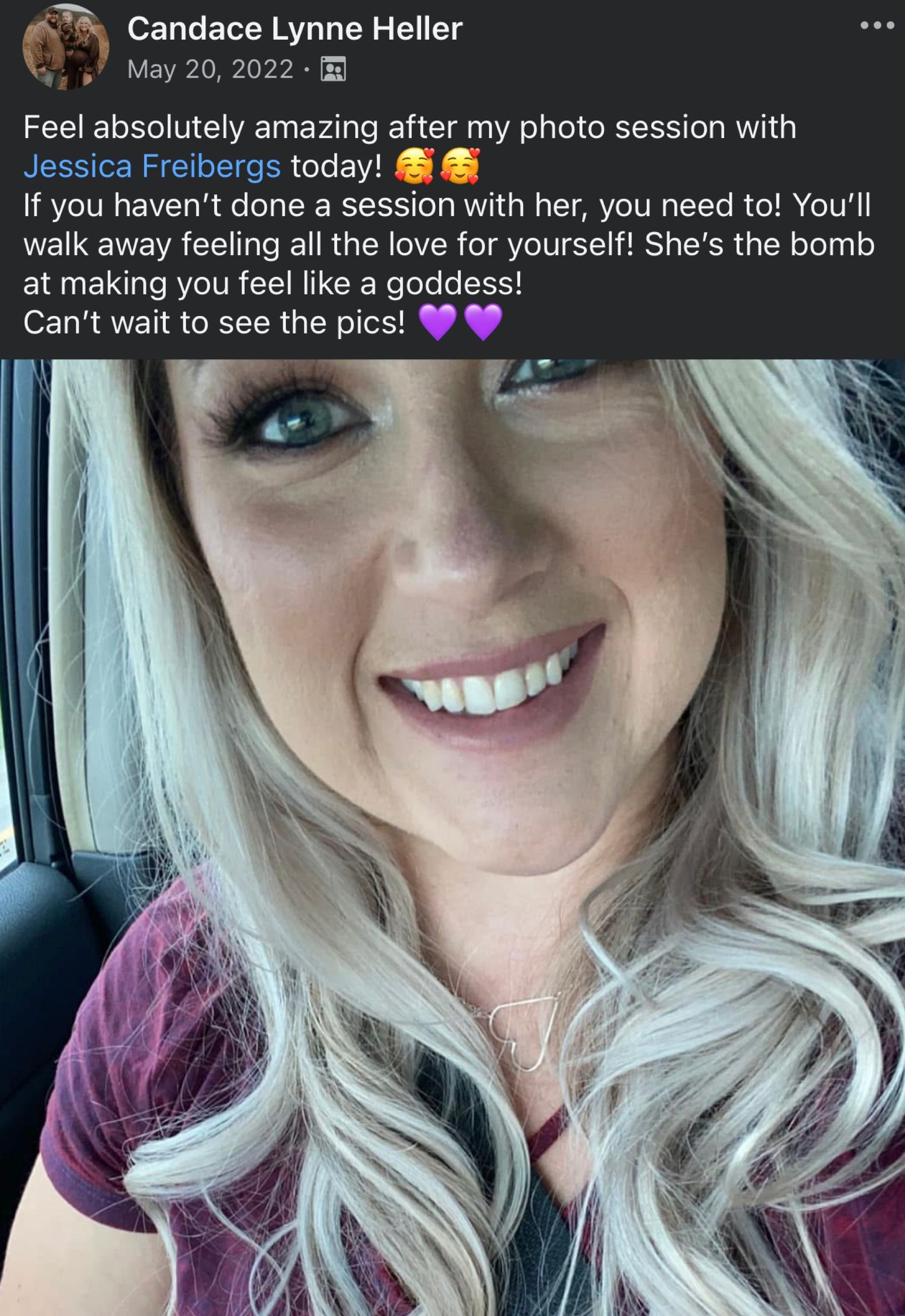 A selfie taken in a car shows a bright smile and long platinum blonde wavy hair against a burgundy top.