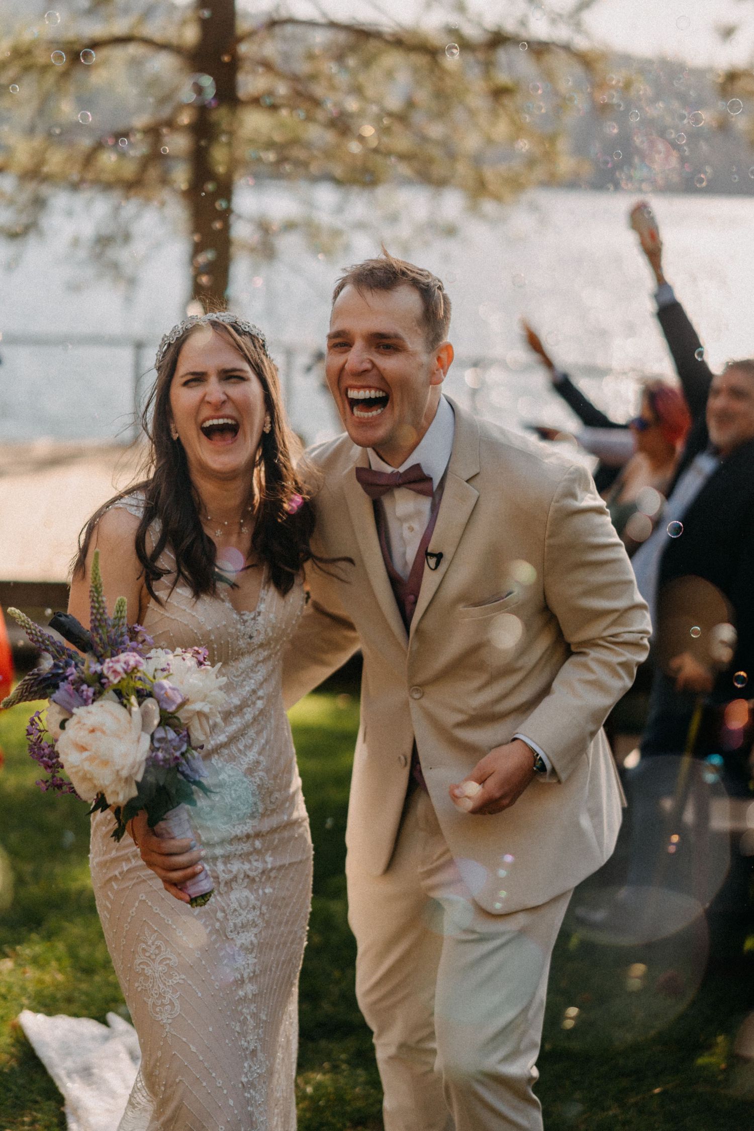 A joyful wedding couple laughs together outdoors in a sequence of candid moments during their celebration.