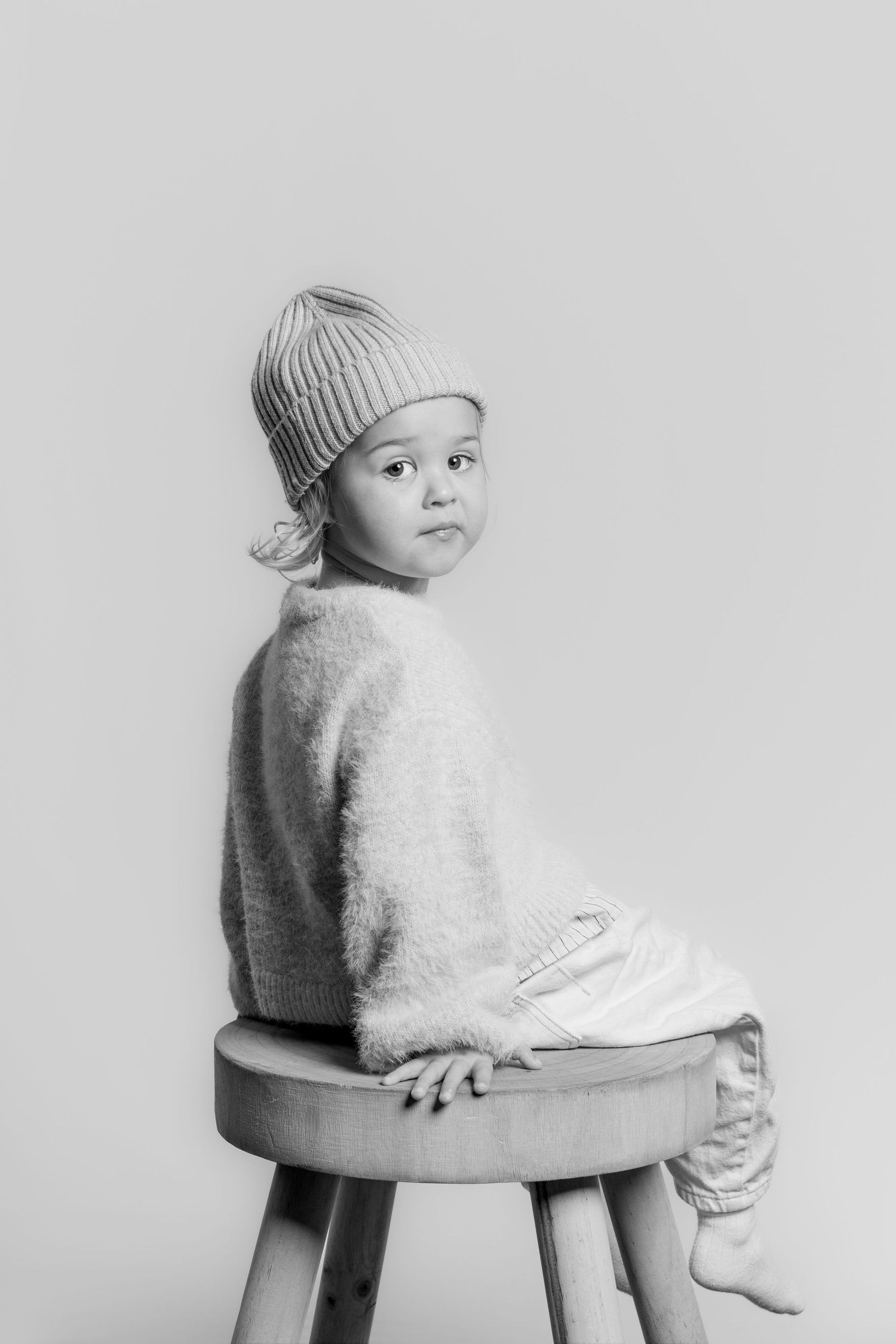 Studio portrait: Fine-art studio portrait with minimal styling and controlled lighting