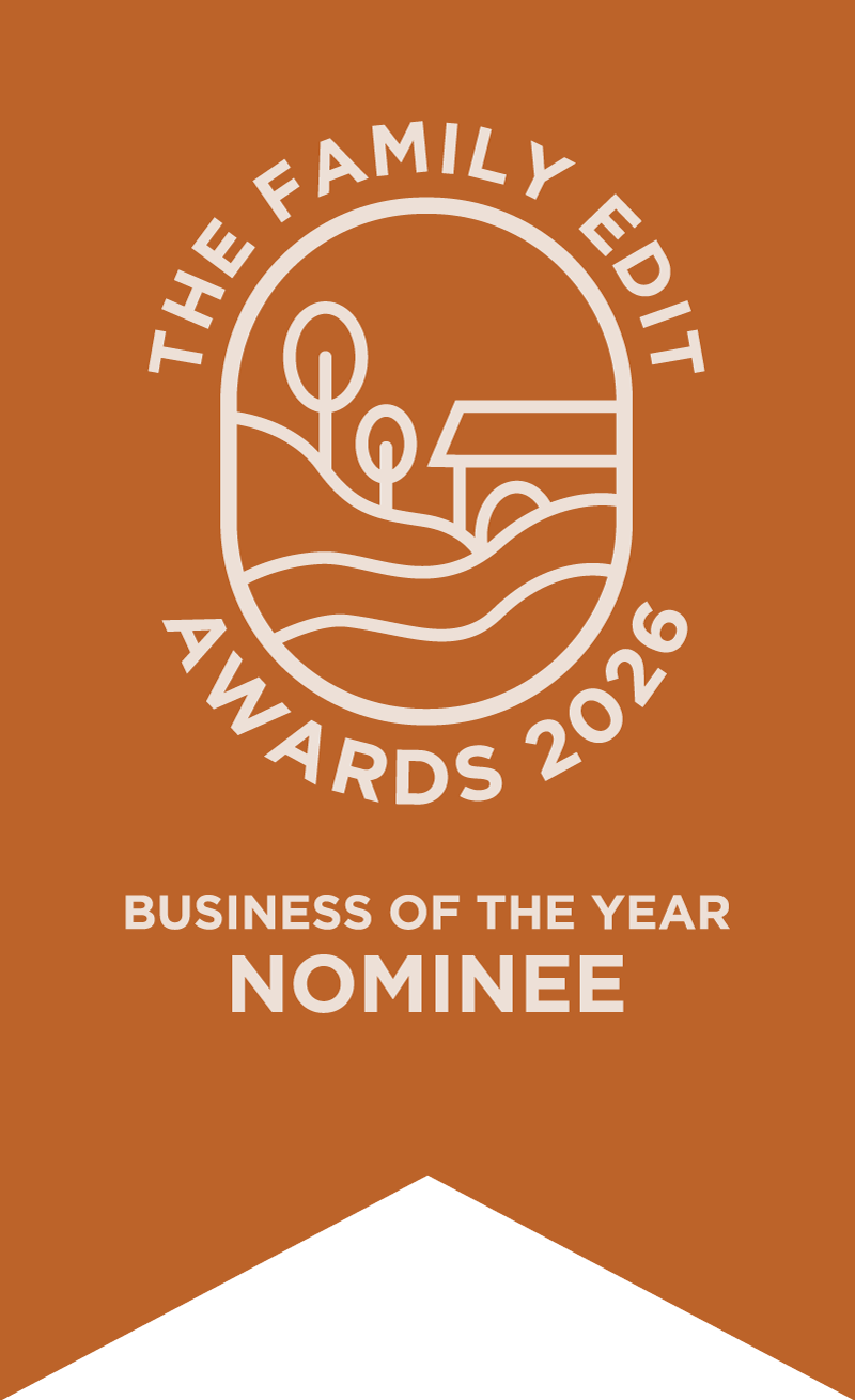 Three orange banner-style business award badges showing 