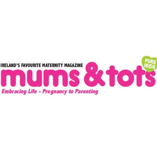 Pink and white logo for Mums & Tots, Ireland's favorite maternity magazine focused on pregnancy and parenting.