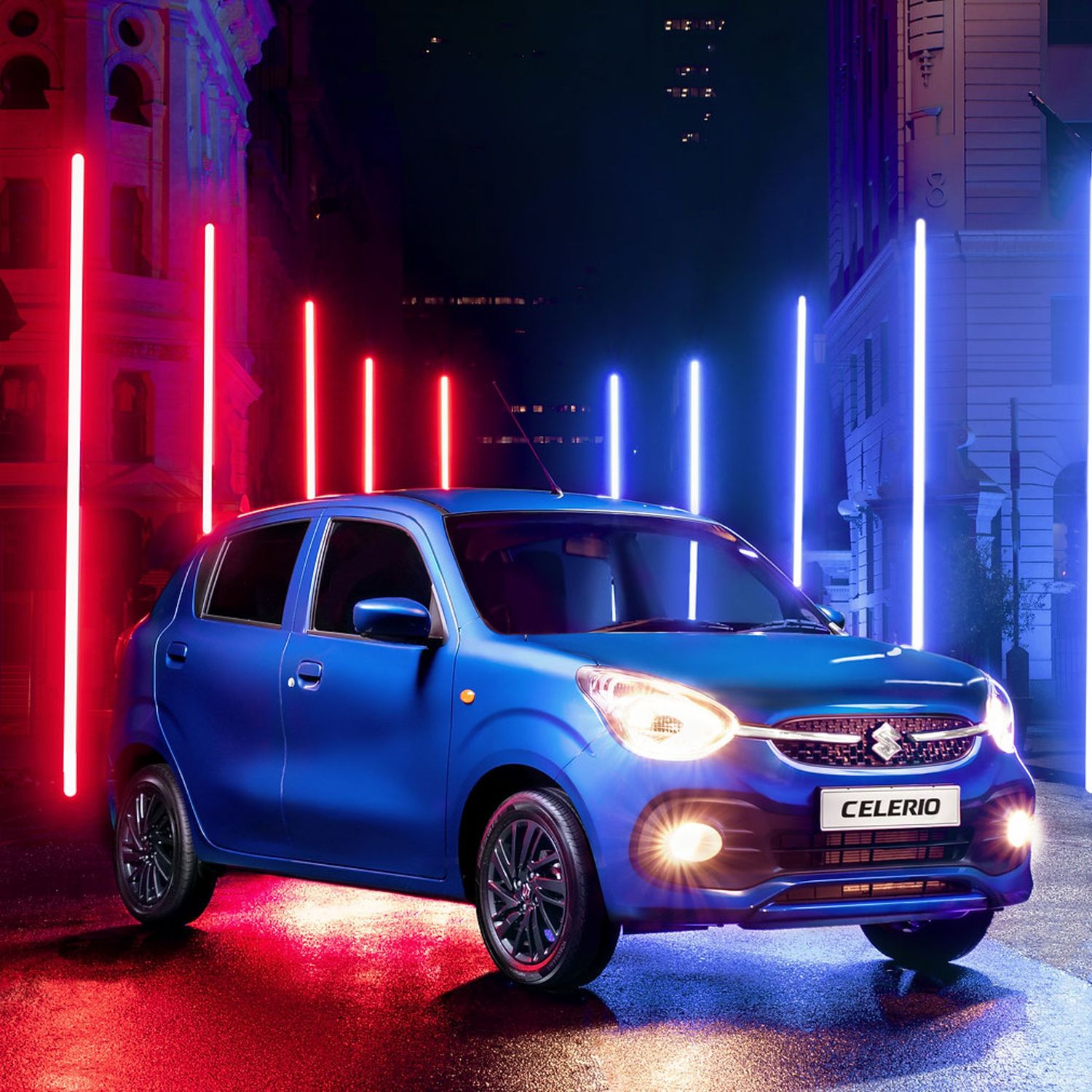 Sports car photographed at night with dramatic red and blue neon lighting effects.