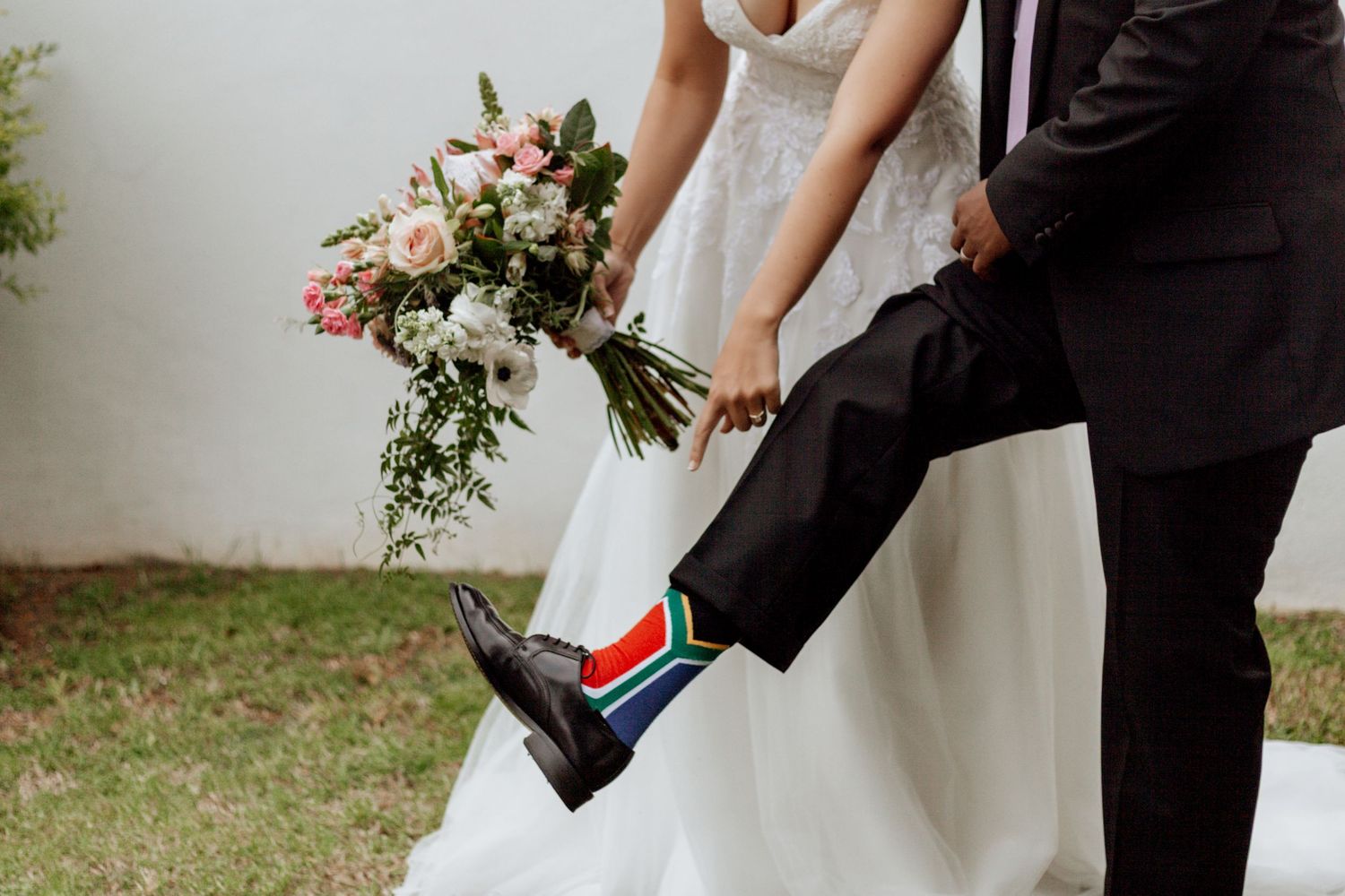 A series of photos showing close-up details of a rustic outdoor wedding with decorative floral arrangements.