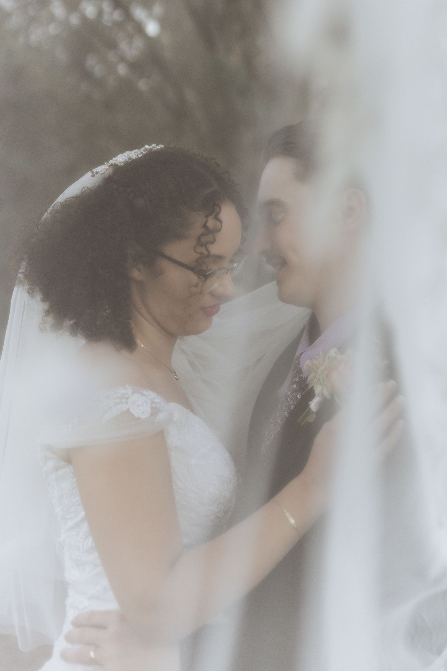 Romantic and ethereal wedding portrait sequence showing intimate moments between newlyweds through a soft misty filter.