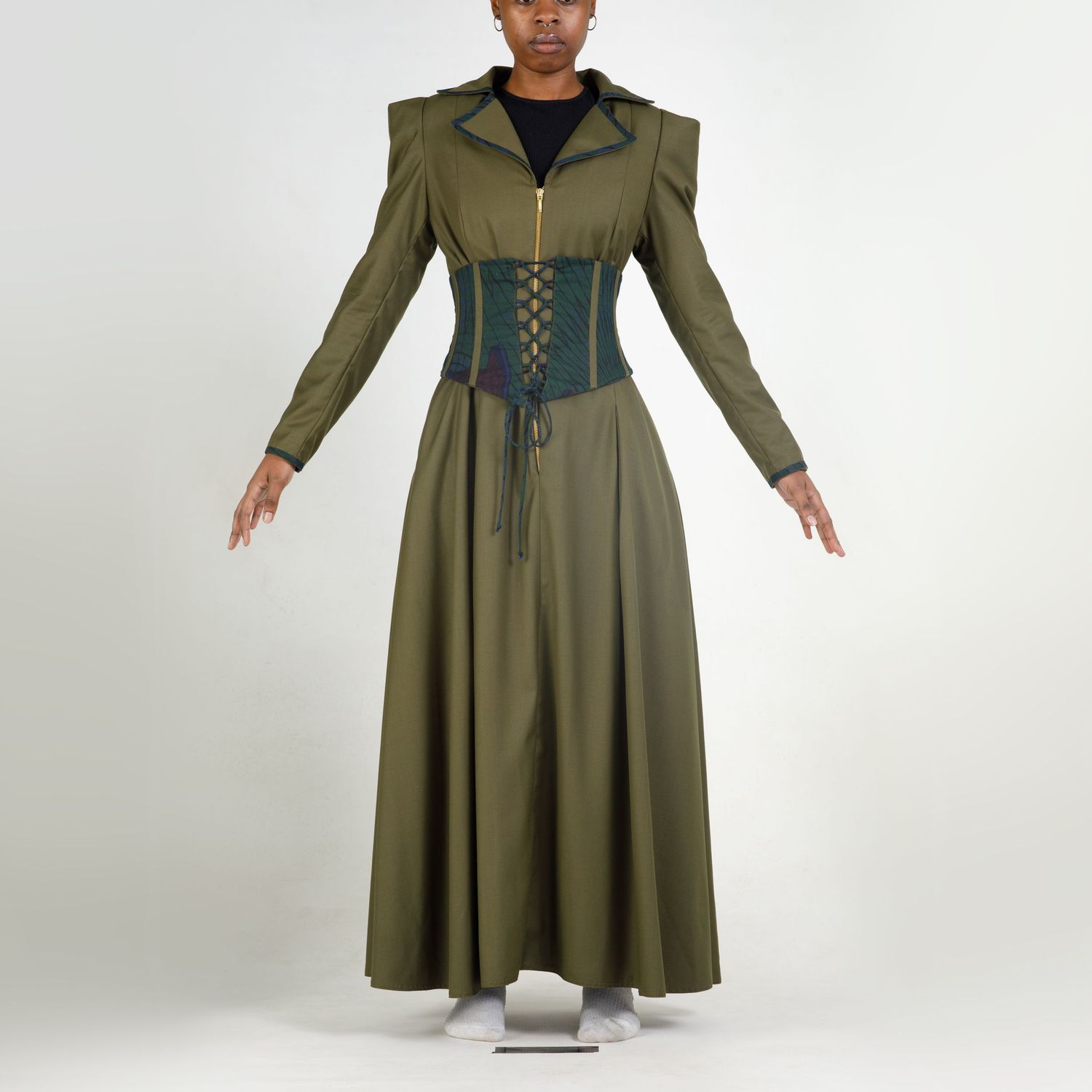 Olive green corset-style dress with long sleeves and flared skirt shown from different angles on white background.