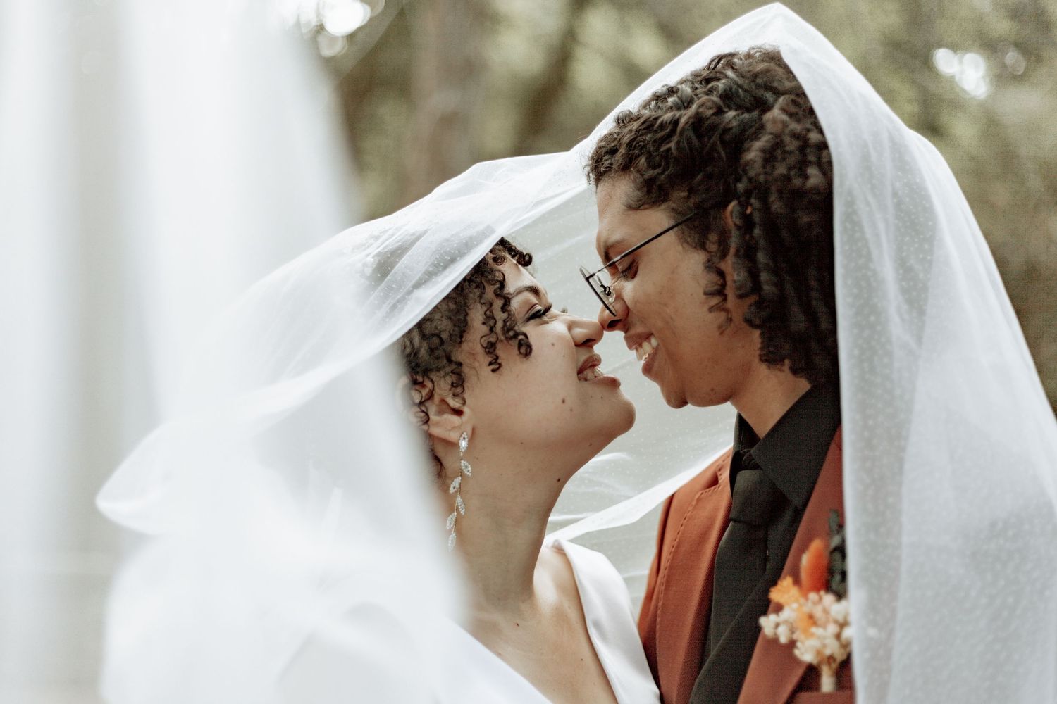 Two people share joyful moments during a wedding ceremony captured in a black and white photo collage.
