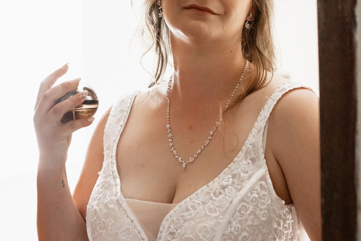 Woman in vintage-inspired white lace dress and silver necklace in artistic bridal photo collage.