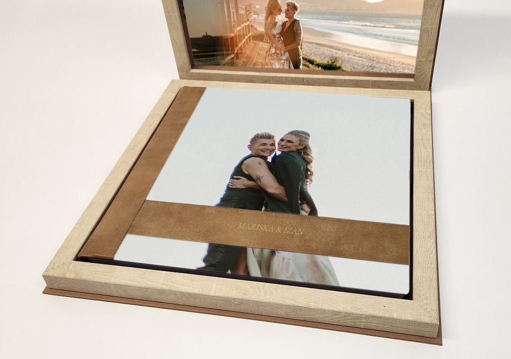 A series of framed black and white photographs arranged in a row showing silhouettes against a bright background.