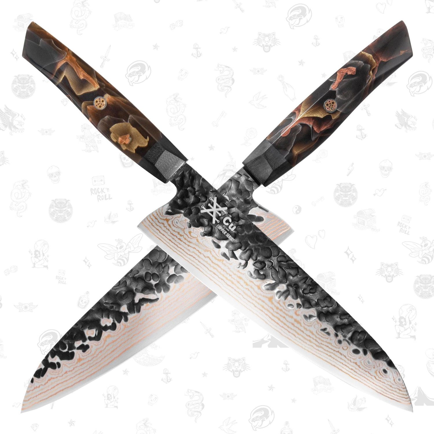 Two handcrafted chef knives with hammered Damascus steel blades and ornate wooden handles crossed in an X formation.