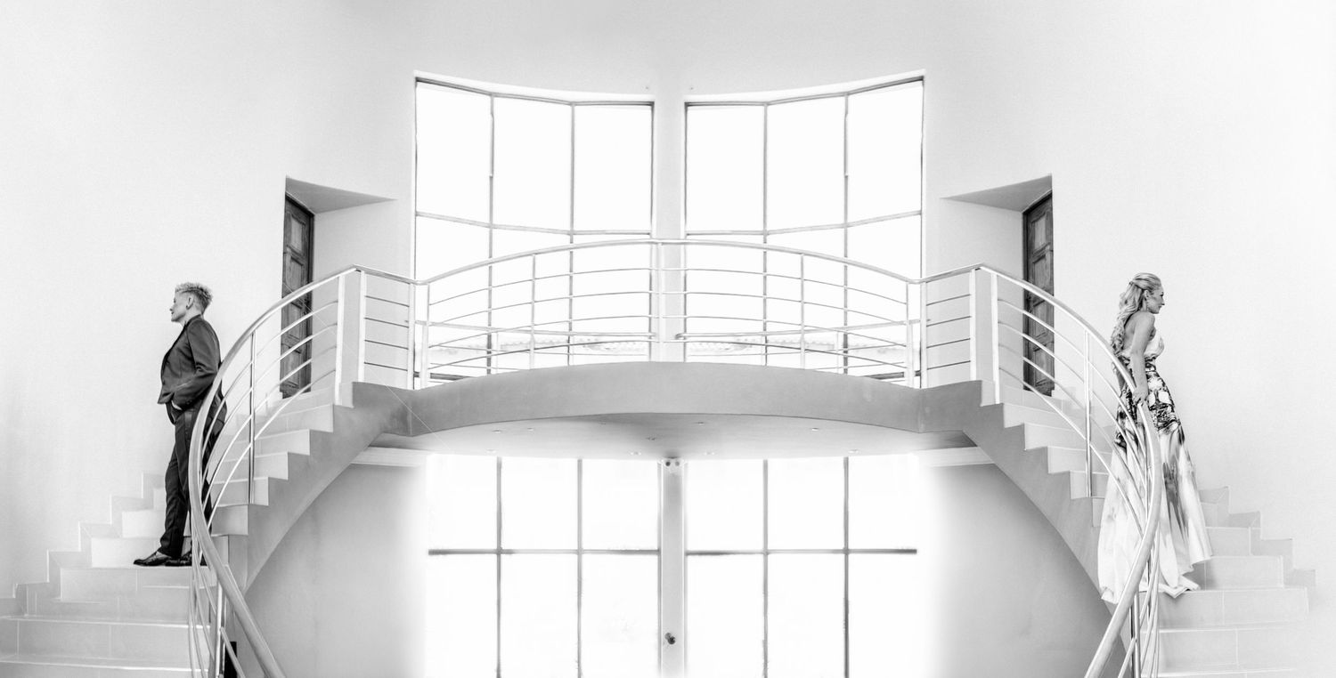 A series of minimalist black and white architectural photographs showing windows, stairs and interior spaces.