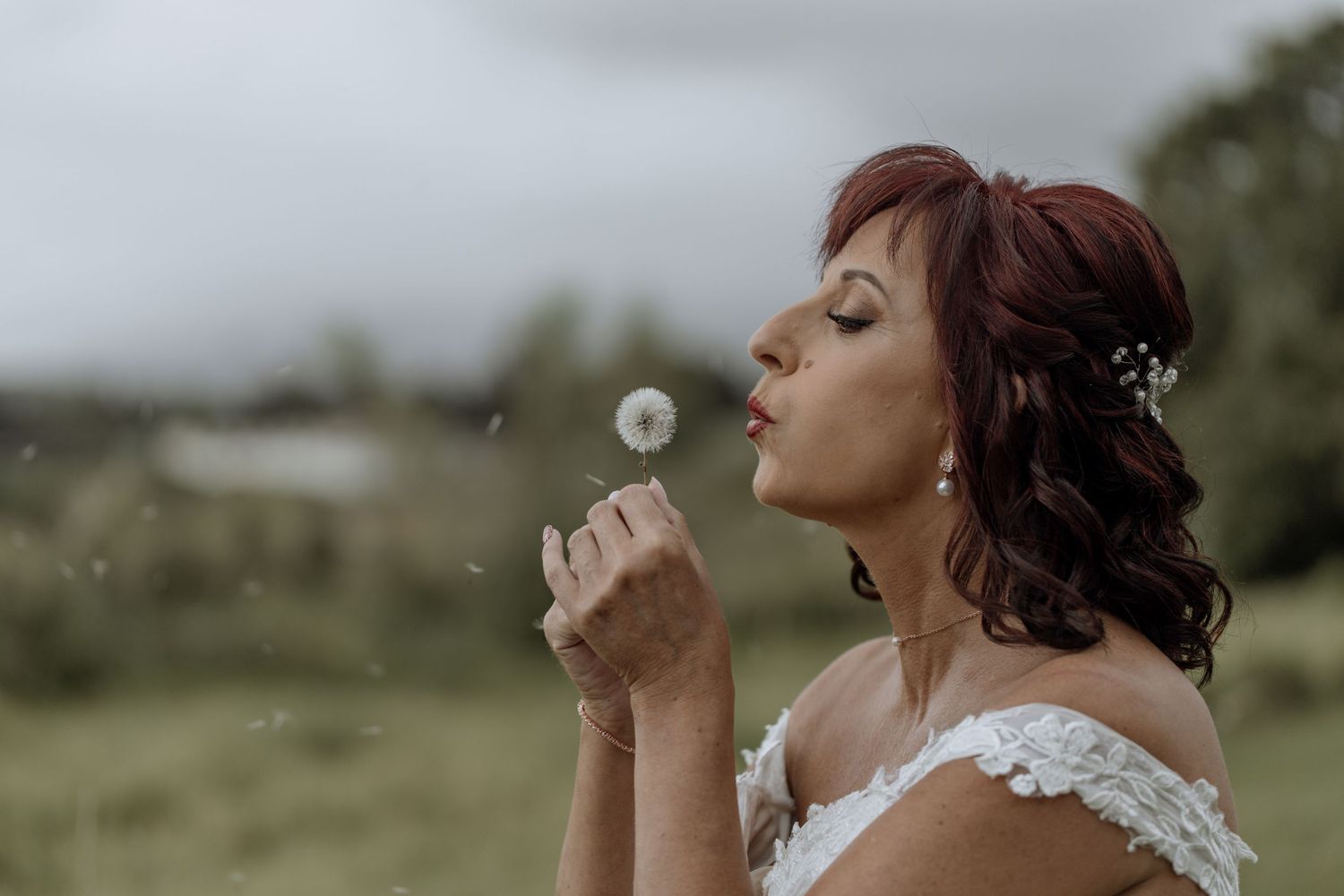 A sequence of images showing someone drinking from a wine glass in a natural outdoor setting.