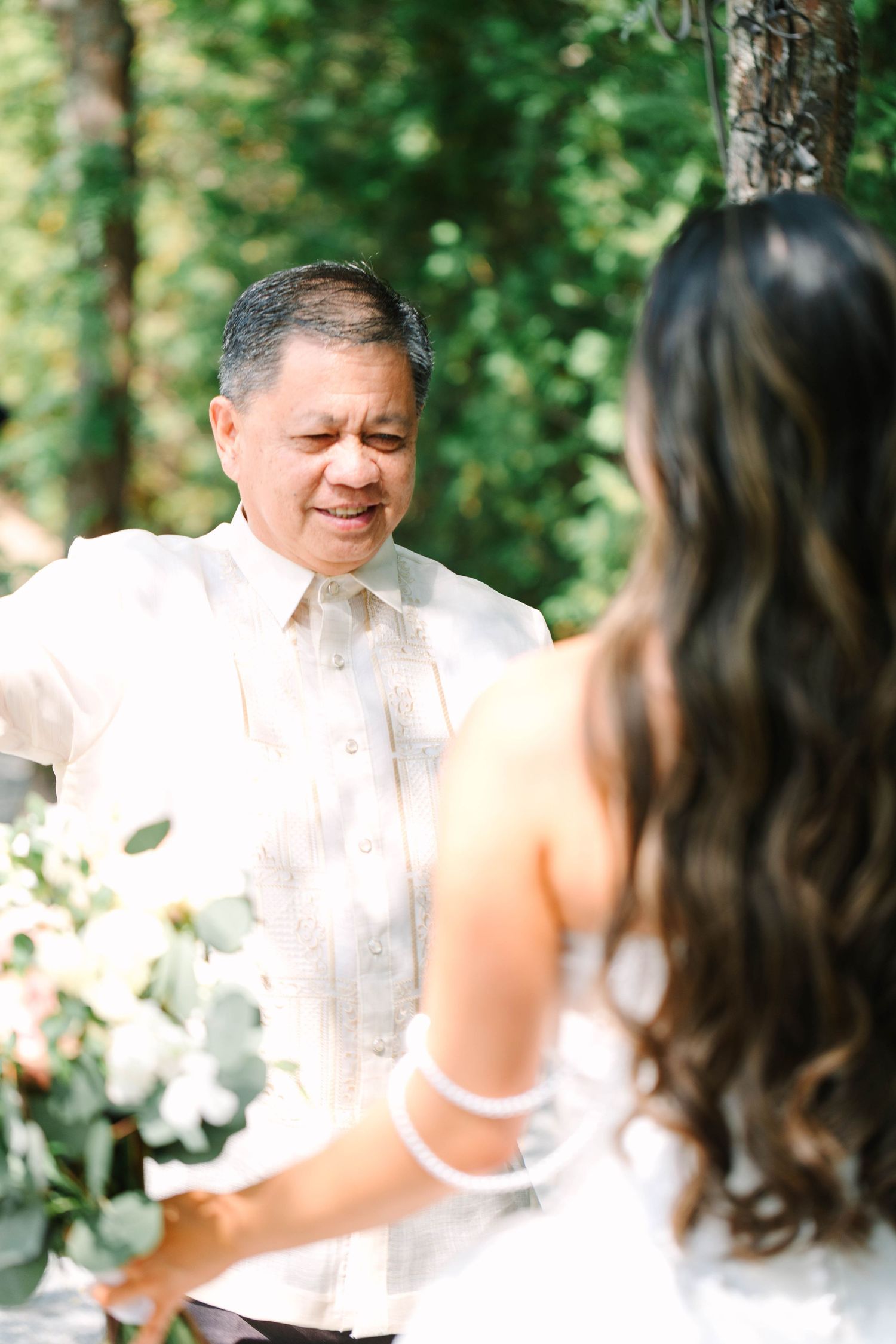 Emotional father sees his daughter in her wedding gown for the first time during a heartfelt first look.