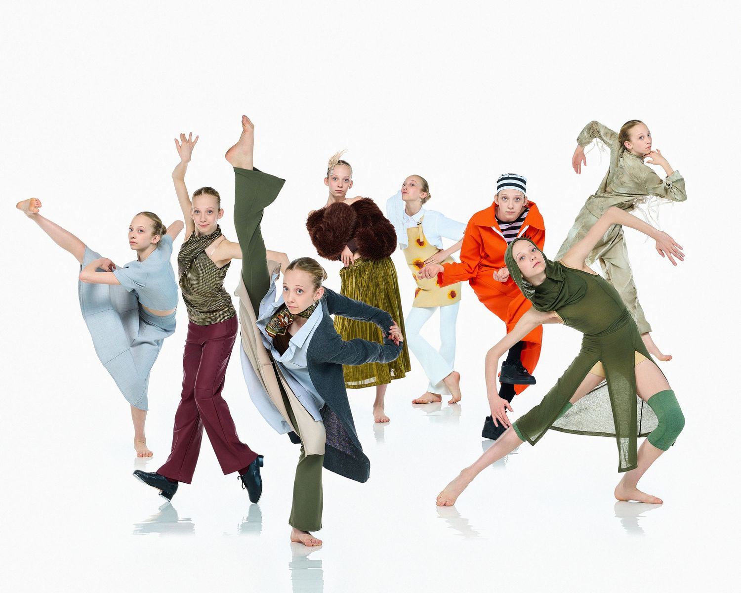 Dynamic series of dancers leaping and jumping in colorful casual outfits.