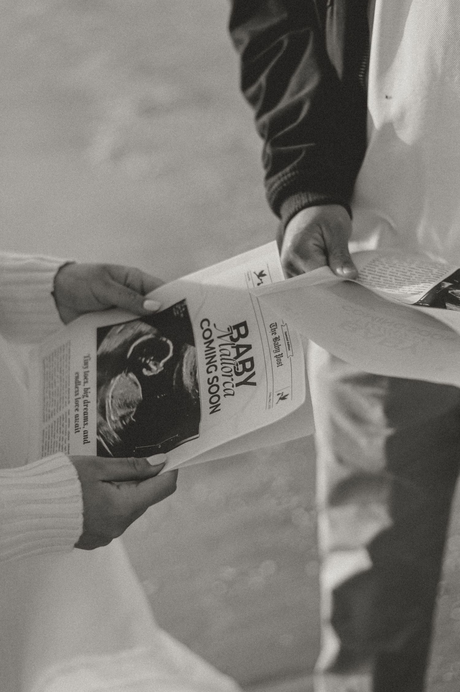 Black and white photo sequence showing hands opening and reading a letter or document.