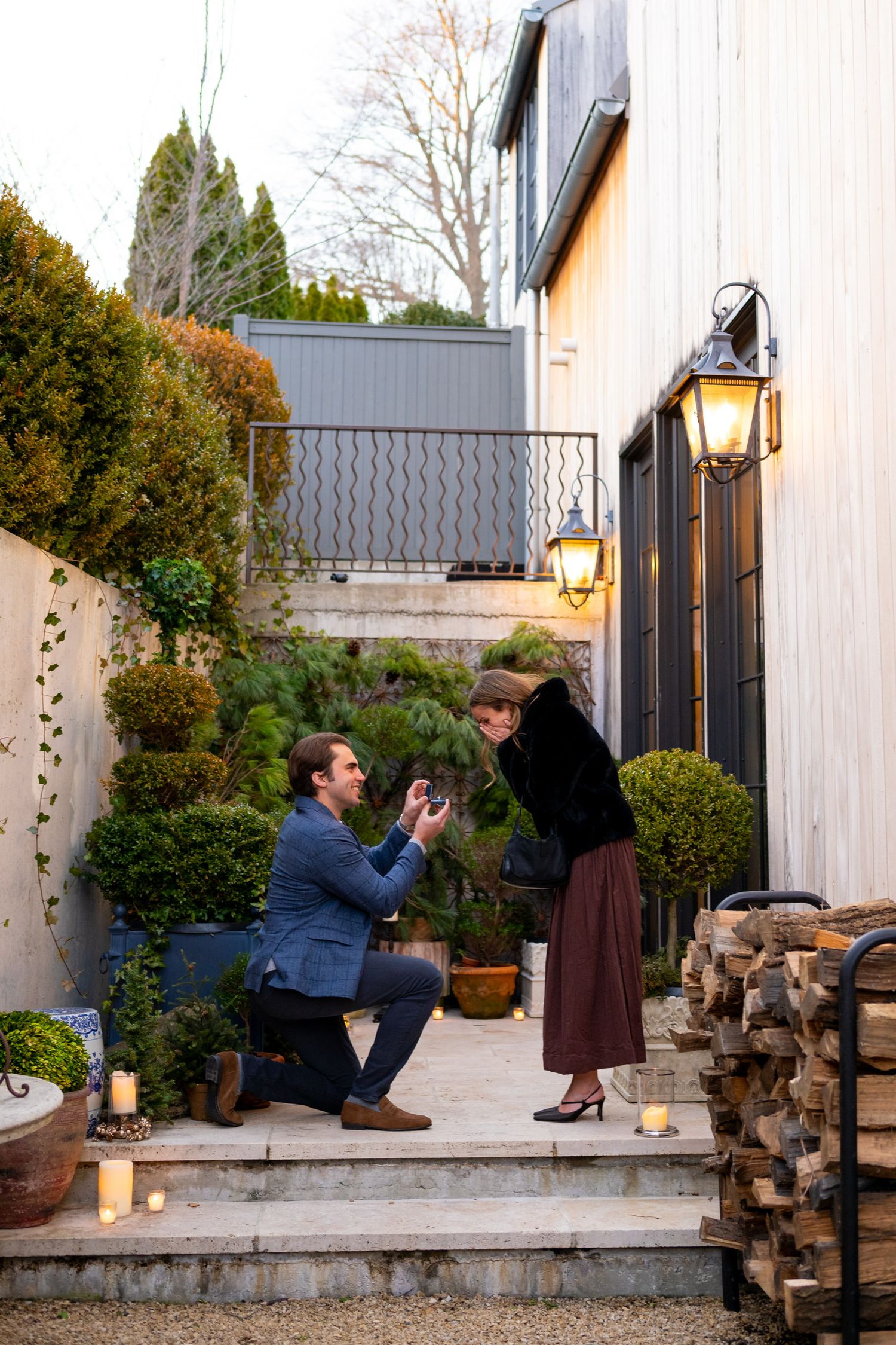 A proposal scene captured in sequence showing a couple on stone steps in Greenwich, Connecticut.