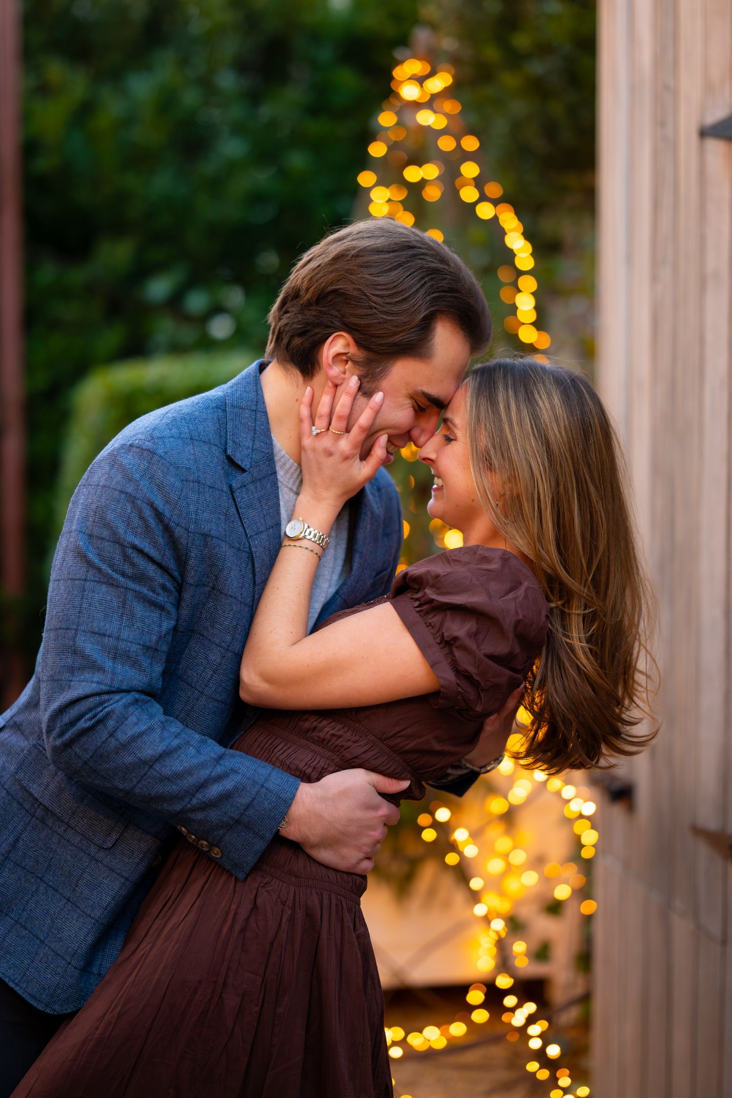 A romantic evening portrait with twinkle lights creating a magical atmosphere in Greenwich, Connecticut.