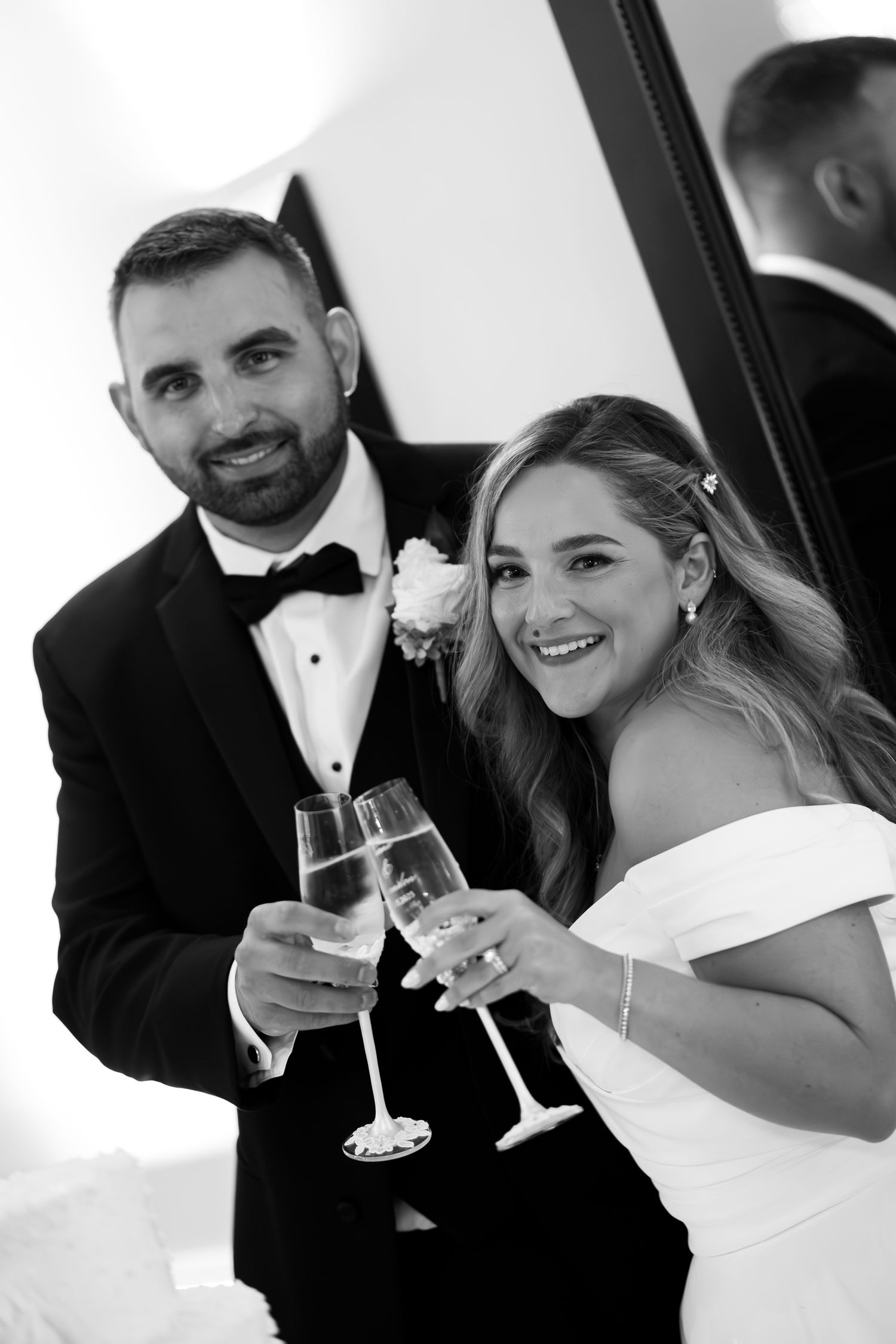 A bride and groom share a celebratory toast with champagne glasses in a series of candid wedding photos.