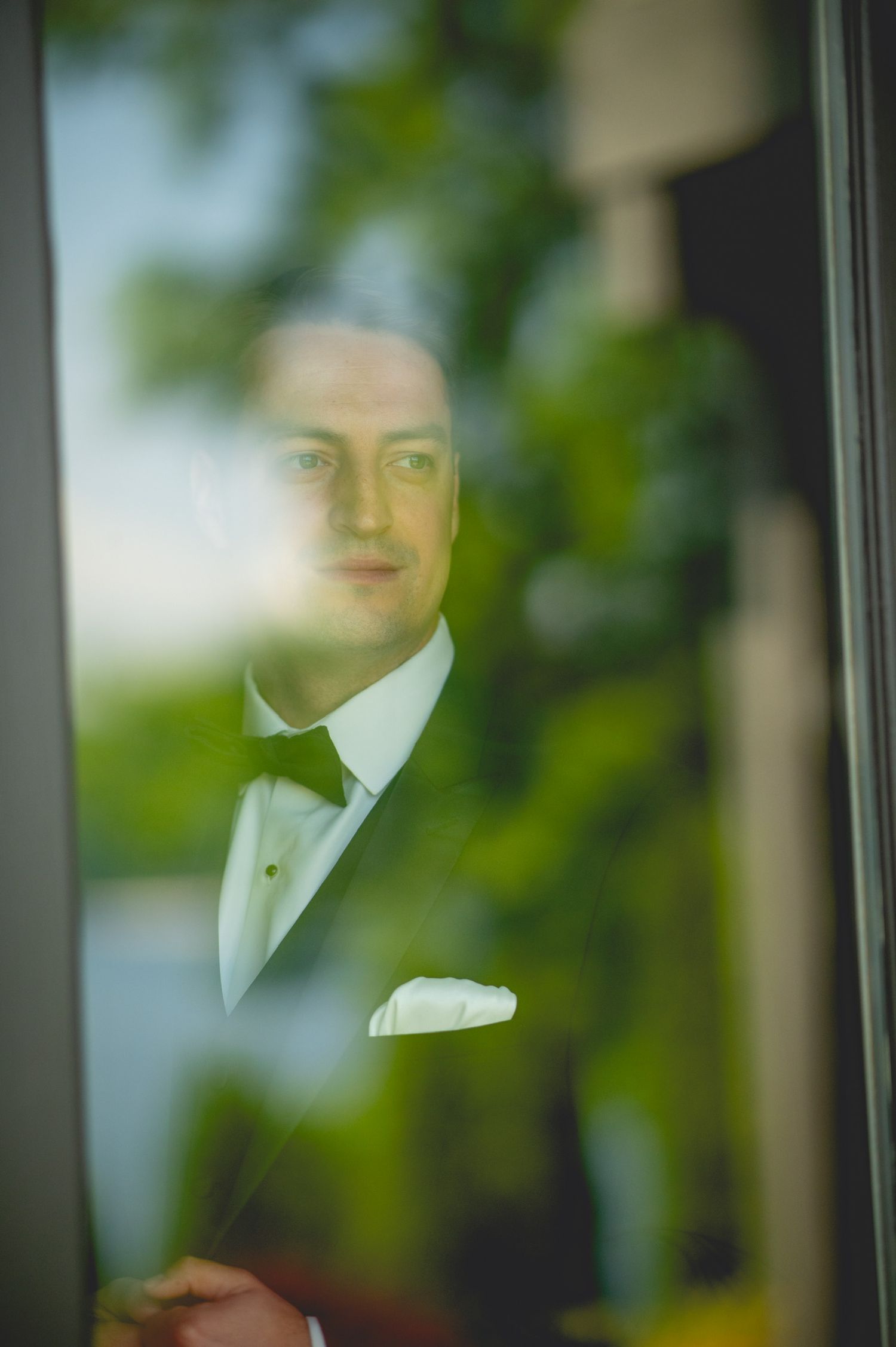 Artistic reflection in window panes with soft bokeh effect.