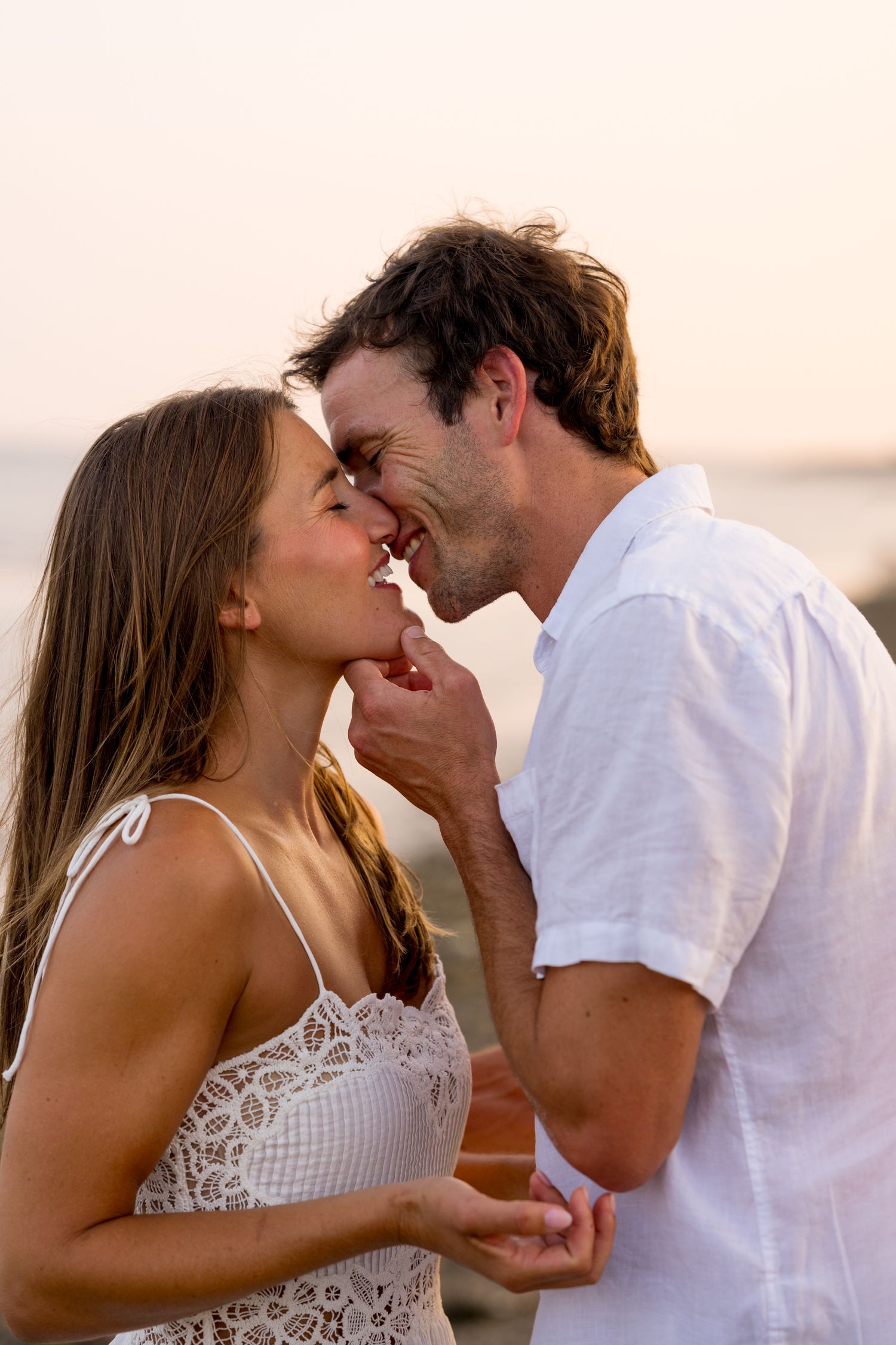 A tender romantic moment captured in a series of intimate photos at sunset.