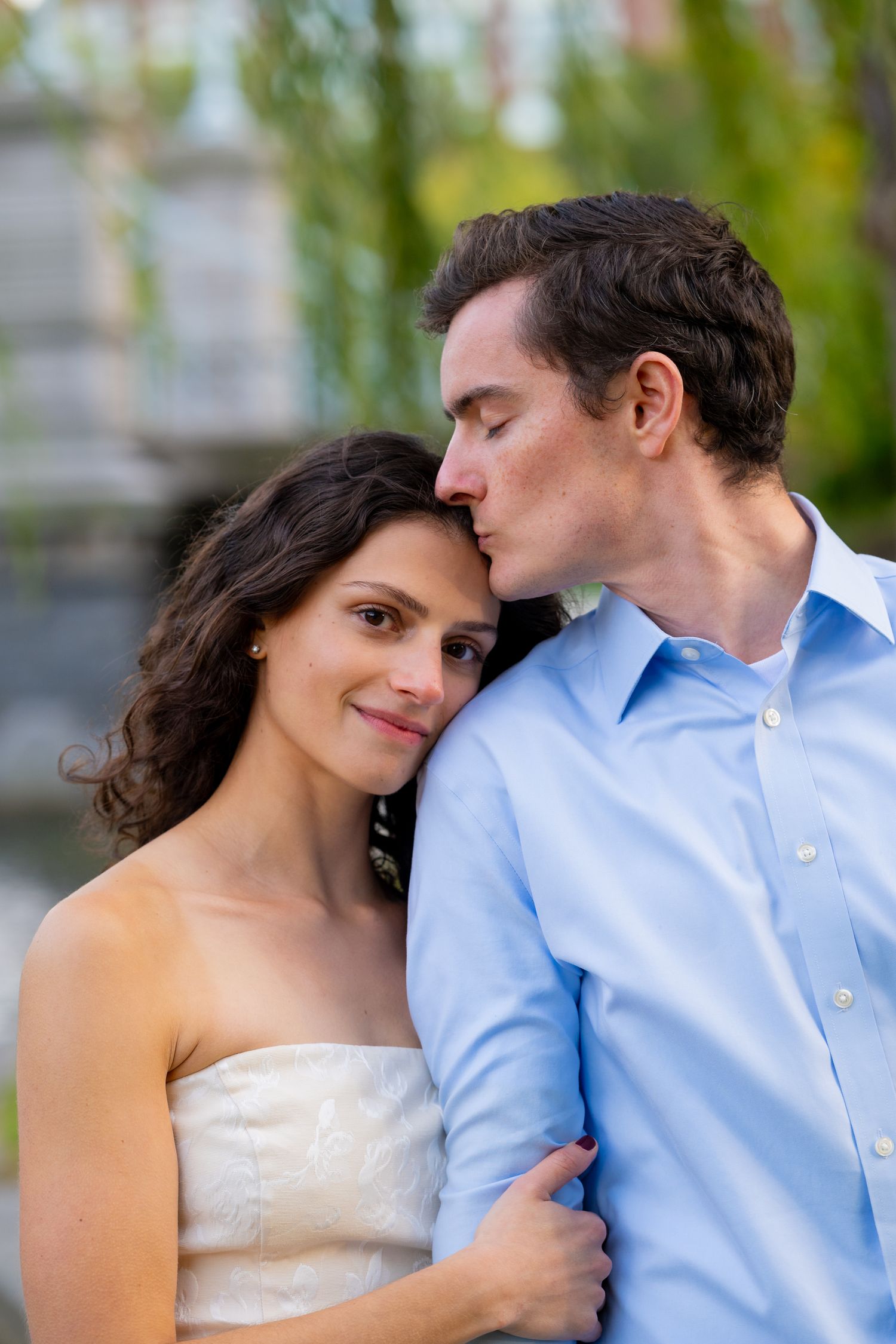 A tender romantic moment captured in Boston Public Gardens.