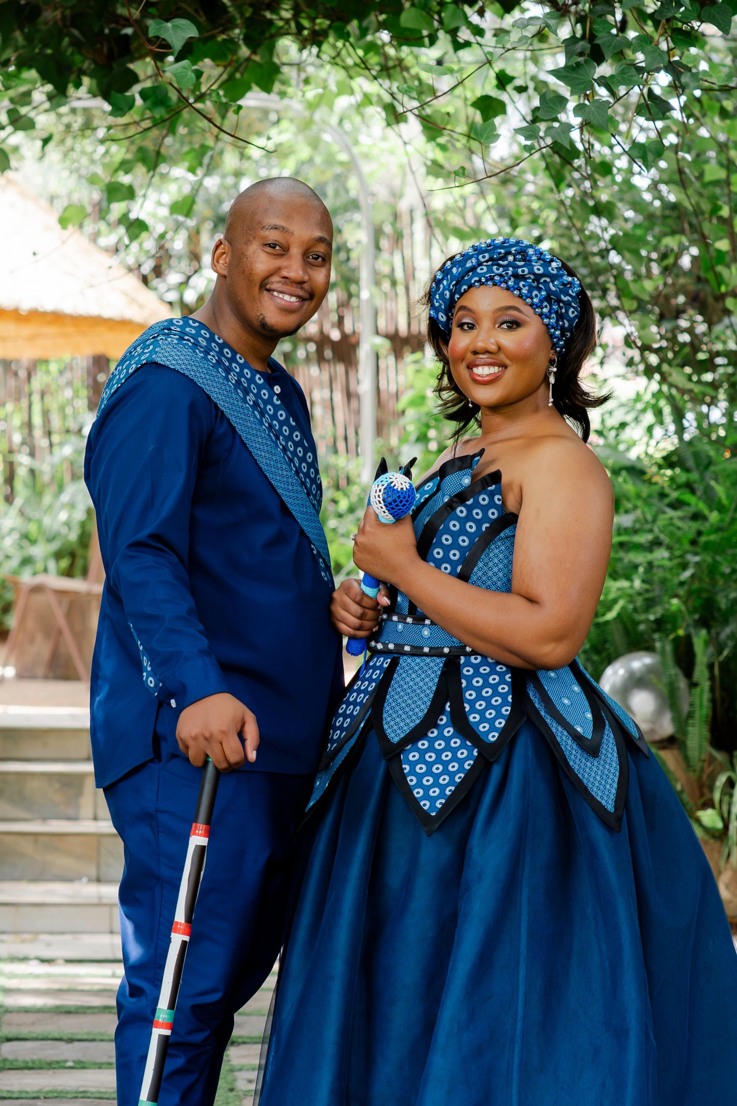 Bride and groom in traditional blue South African wedding attire at their Gauteng wedding