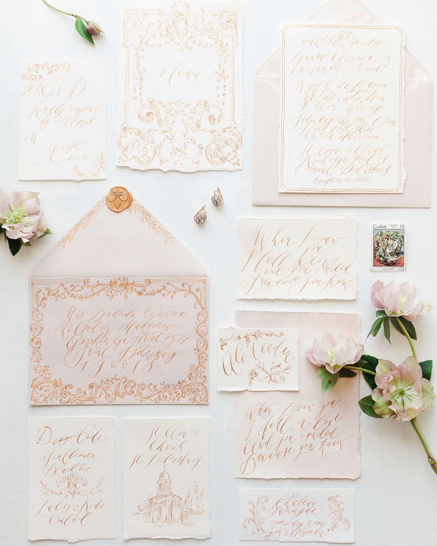 Elegant wedding invitation suite with lace detail, calligraphy and a wax seal