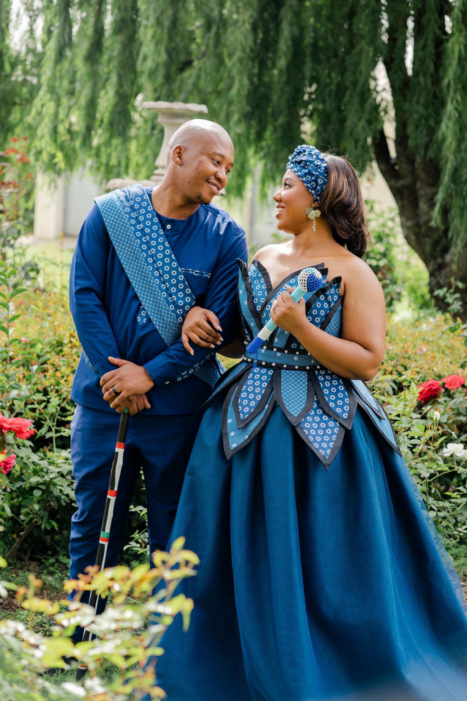 Bride and groom sharing a joyful moment in a garden at their Gauteng wedding
