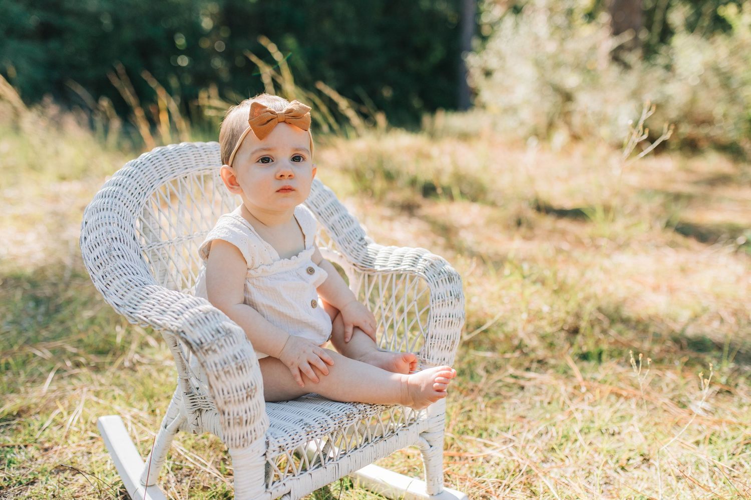 baby in rocking chair outside