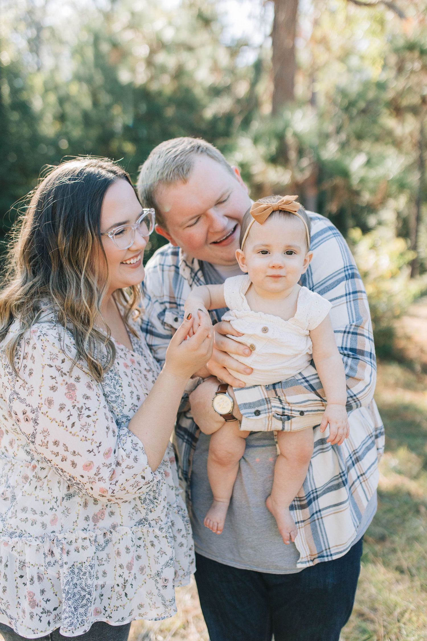 family photo in a field. baby. natural light