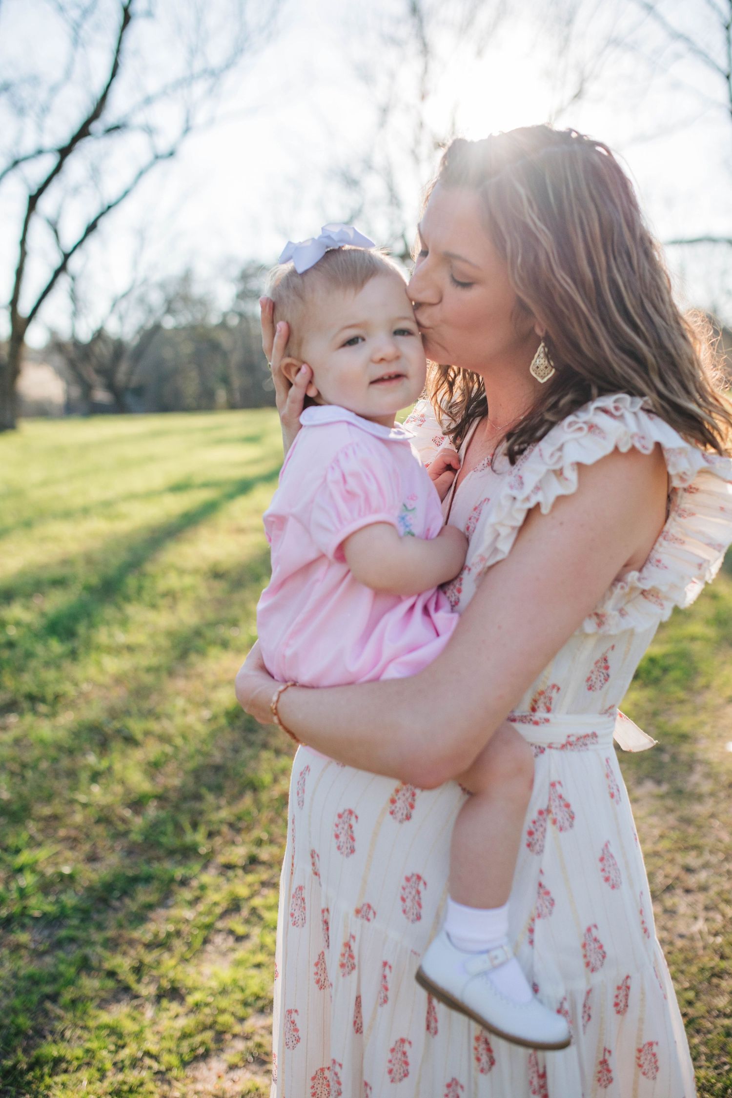 mom and daughter maternity. natural light field photo