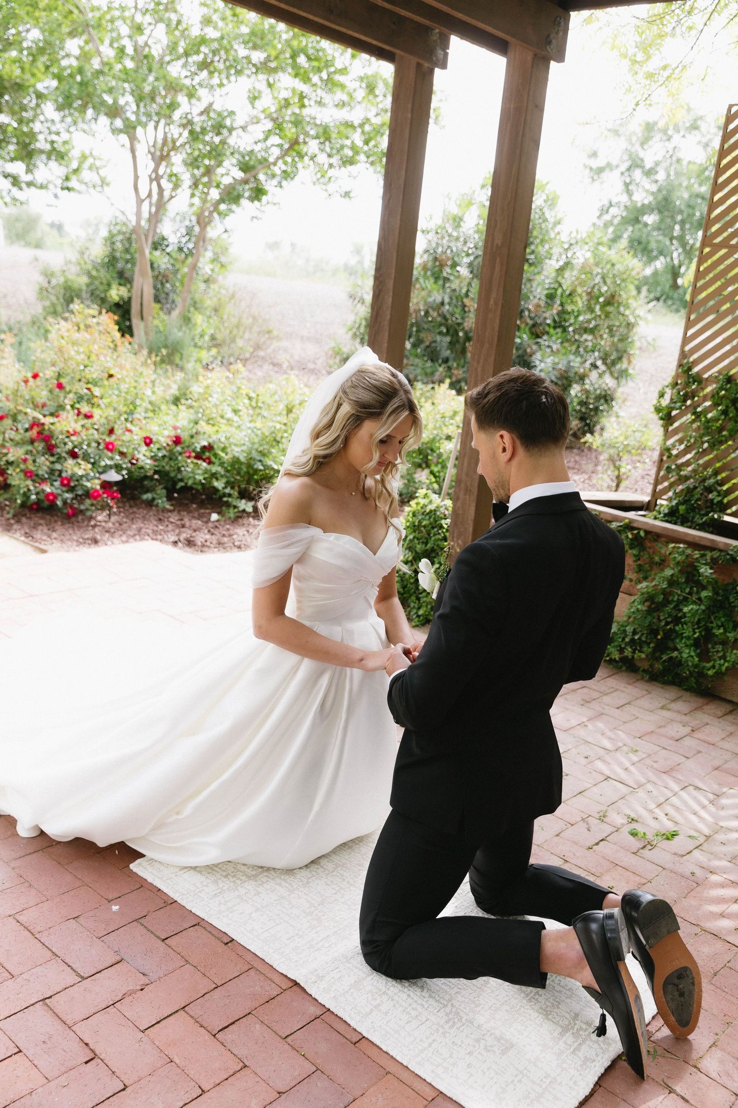 A series of candid wedding moments captured under a wooden pergola with garden views.
