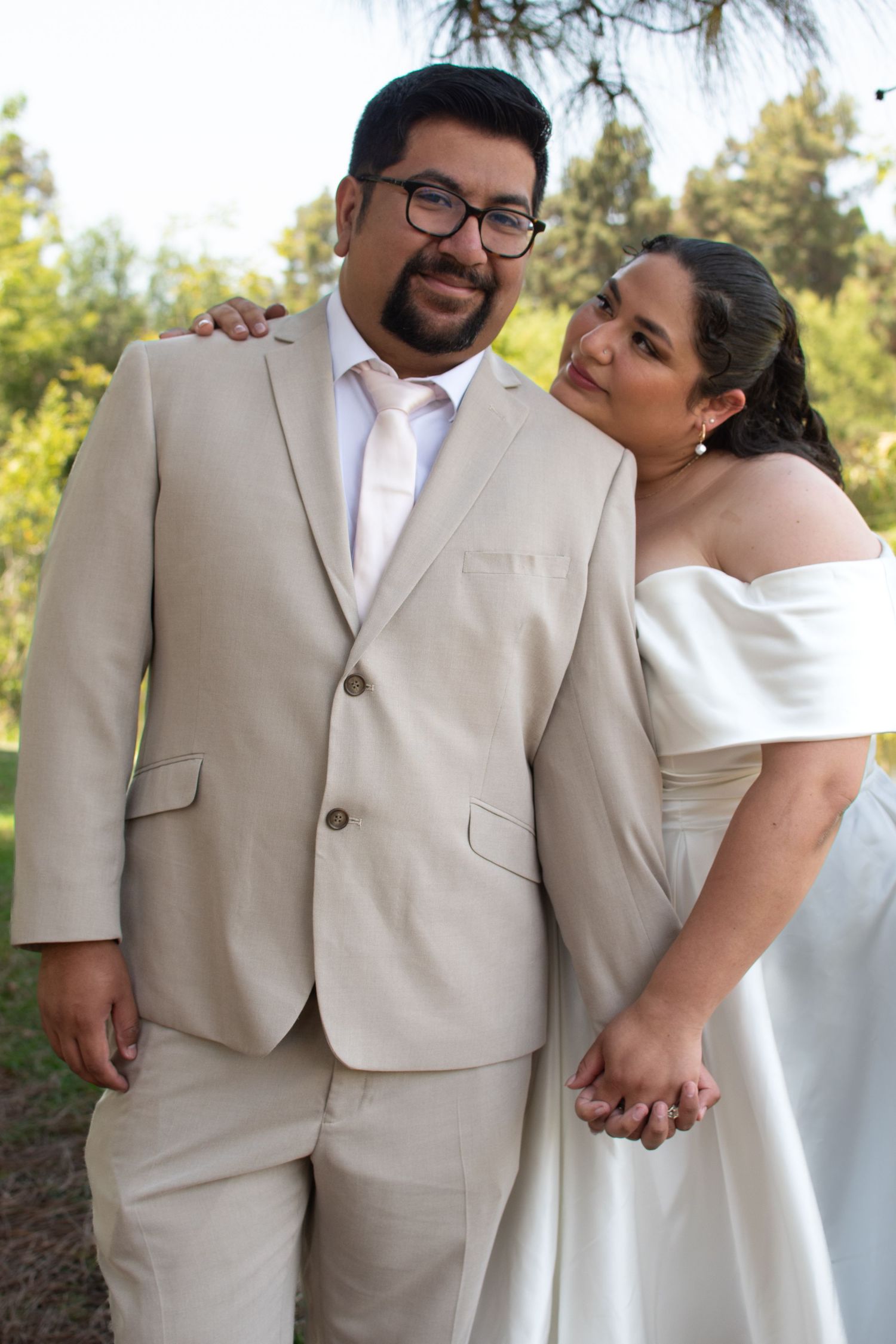 Wedding couple in beige and white attire share intimate moments in a series of romantic outdoor photos.