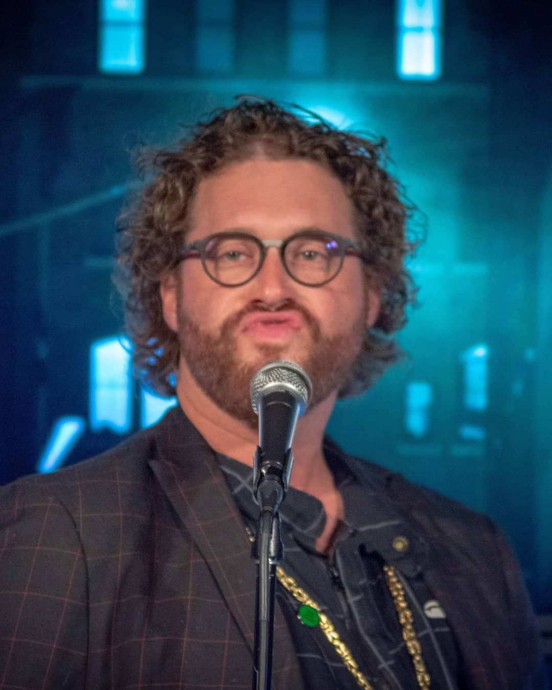male comedian making a funny face