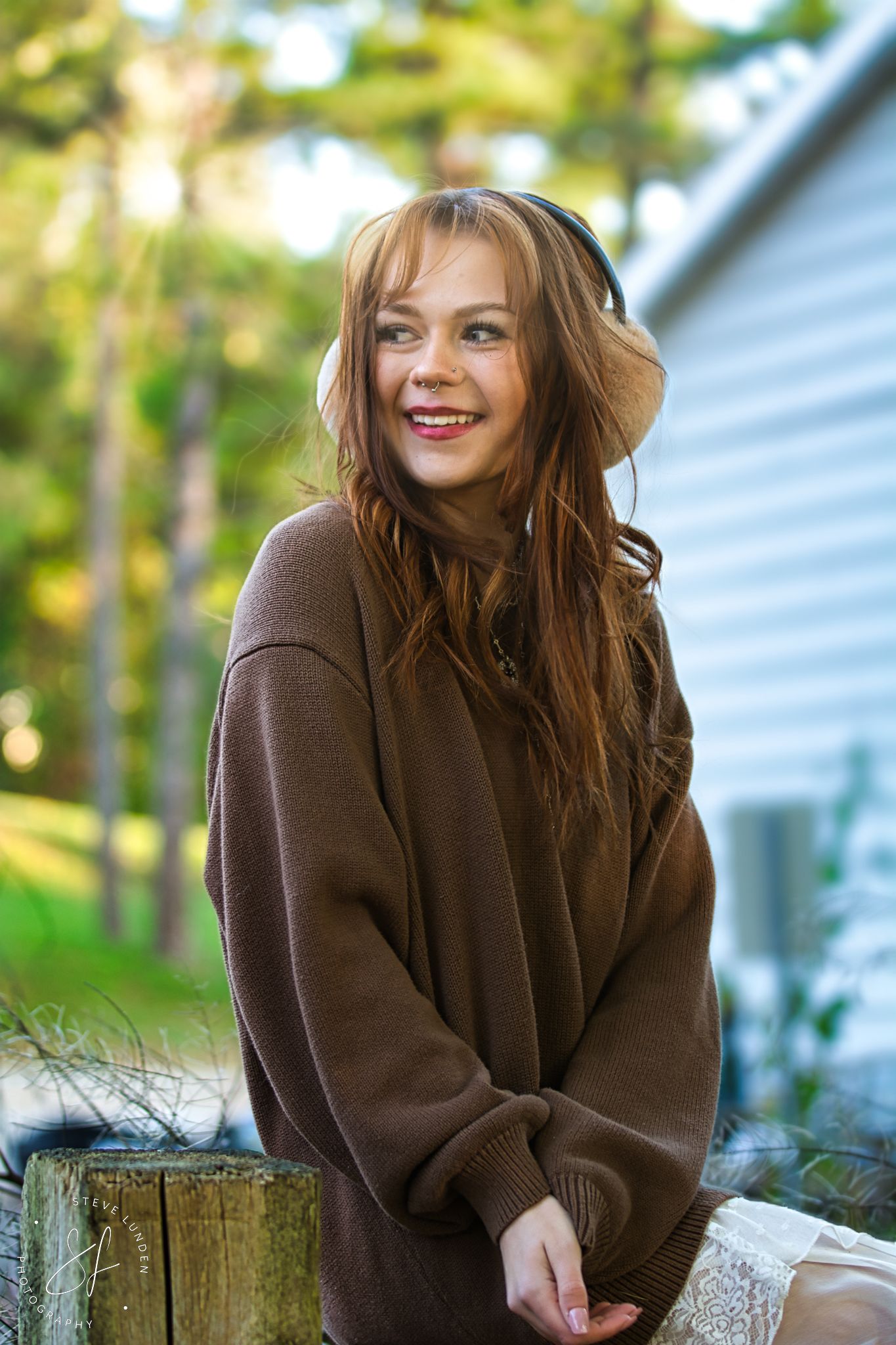 teenage girl posing in the fall