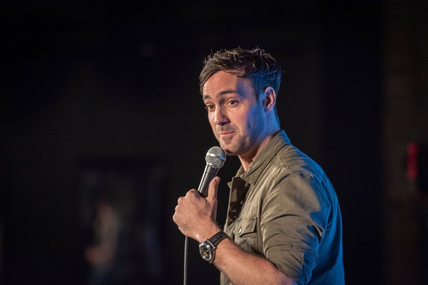 male comedian on stage