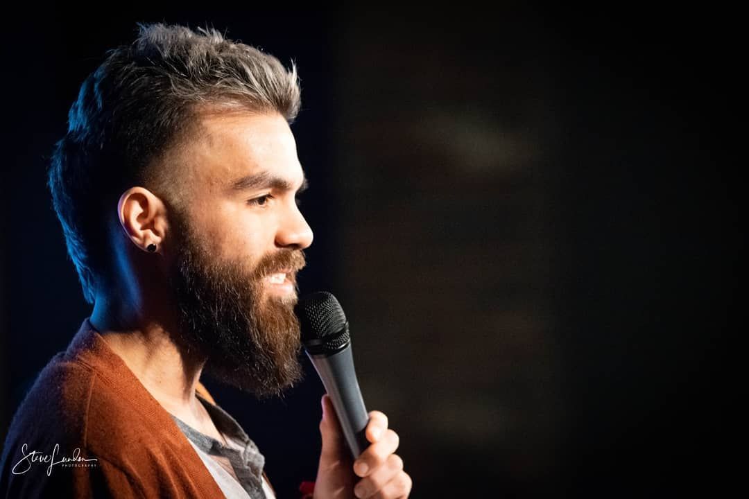 close up of male comedian on stage