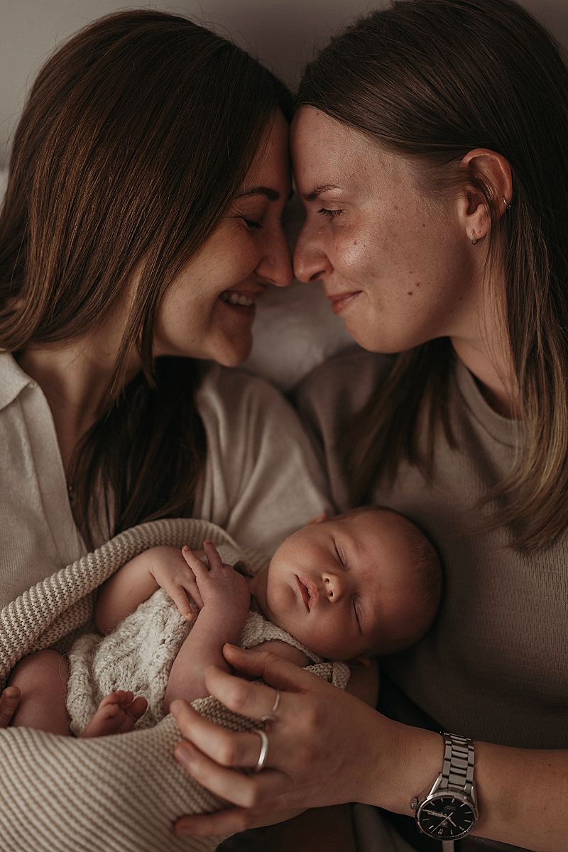 lifestyle newborn portrait with both mums geelong studio photography